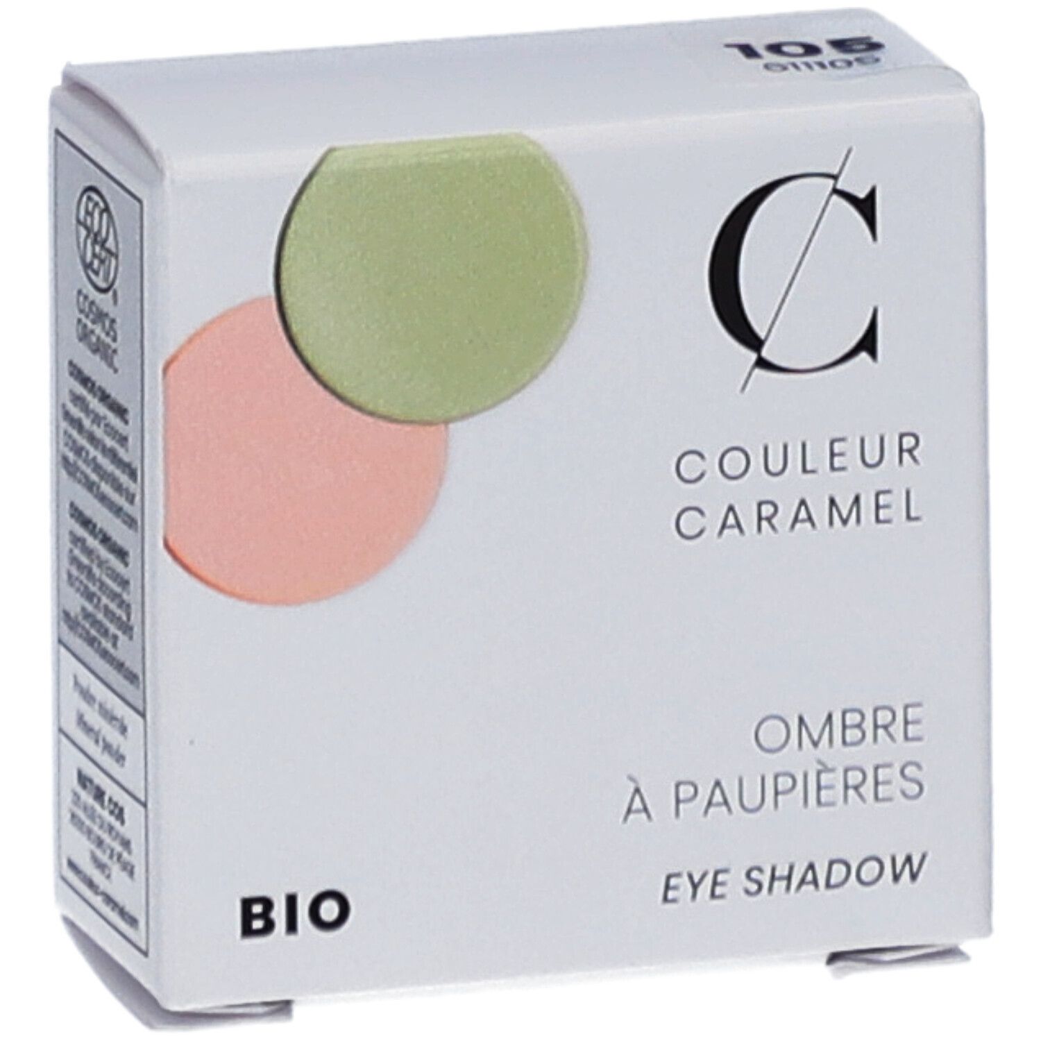 Boîte blanche avec fard à paupières. Marque COULEUR CARAMEL, BIO. Deux couleurs rondes de fard à paupières. Texte : Ombre à paupières. Certification : COSMOS ORGANIC.