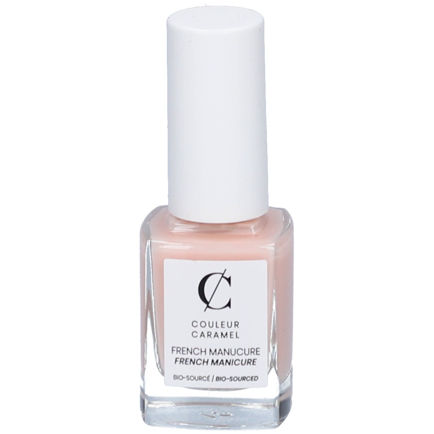 Flacon de vernis à ongles rose avec bouchon blanc. Étiquette "COULEUR CARAMEL" et "FRENCH MANUCURE".