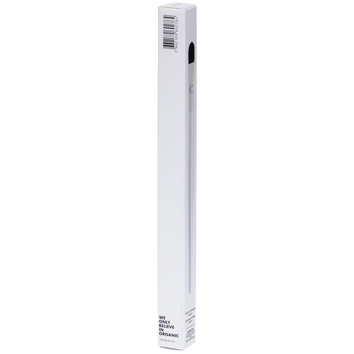 Emballage blanc avec code-barres et informations produit. 'WE ONLY BELIEVE IN ORGANIC'.