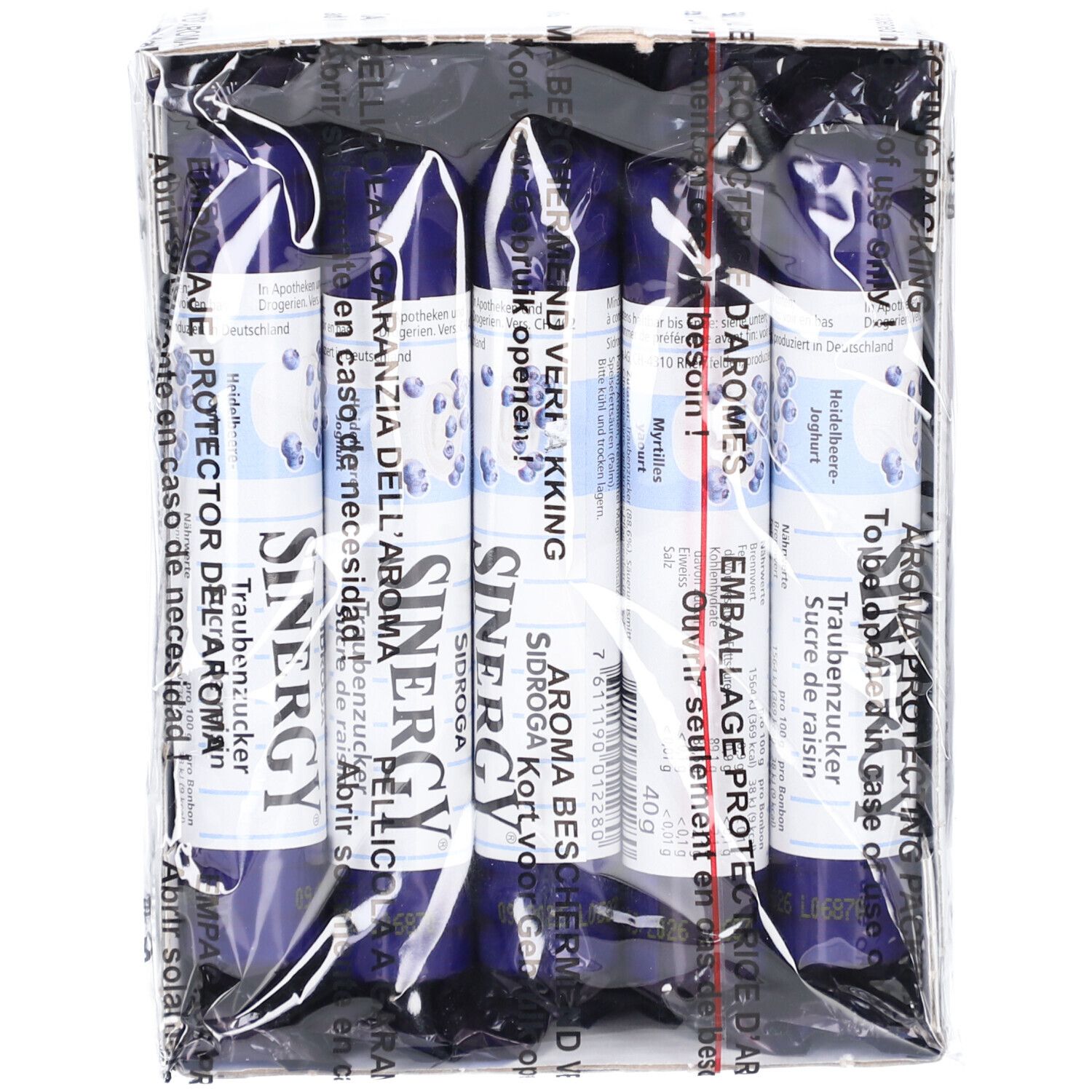 Packung mit zylinderförmigen SINERGY-Traubenzucker-Stäbchen. Blaue Verpackung mit Produktnamen und Aromabeschreibung.