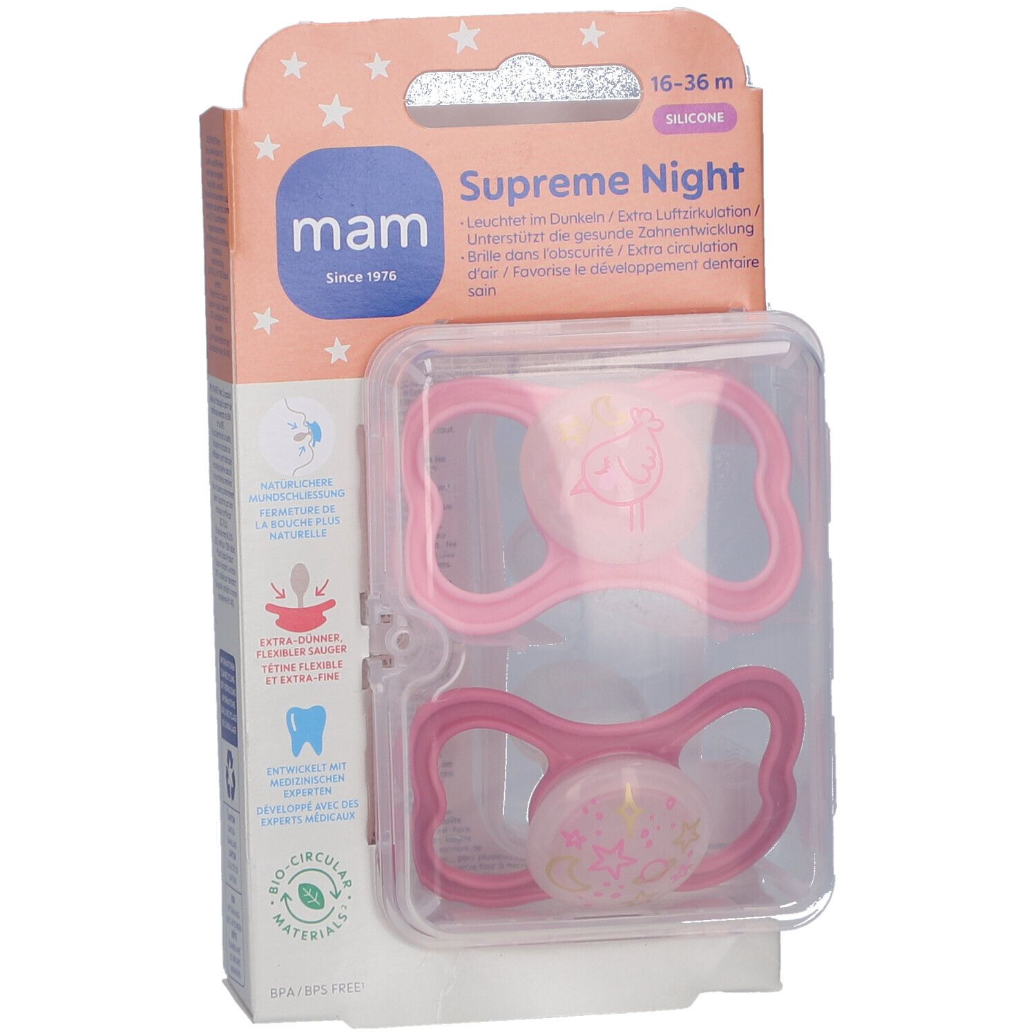 Verpackung mit zwei rosa Schnullern. Marke: mam. Text: Supreme Night, 16-36 m, Silikon. Sichtbare Illustrationen.