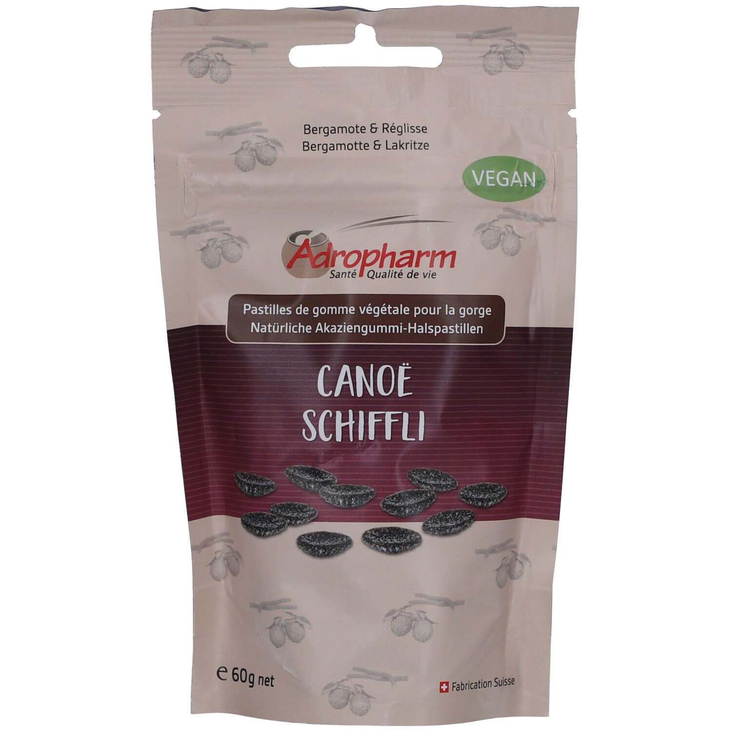 Sachet de pastilles. Logo Adropharm. Texte: Bergamote & Réglisse, Vegan. Illustration de pastilles. 60g net.