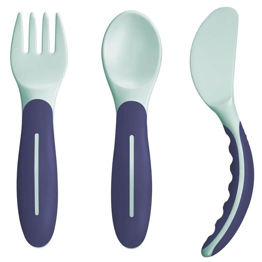 Ensemble de couverts d'apprentissage. Fourchette, cuillère et couteau verts et violets. Poignées avec bande blanche. Couteau à bord ondulé.