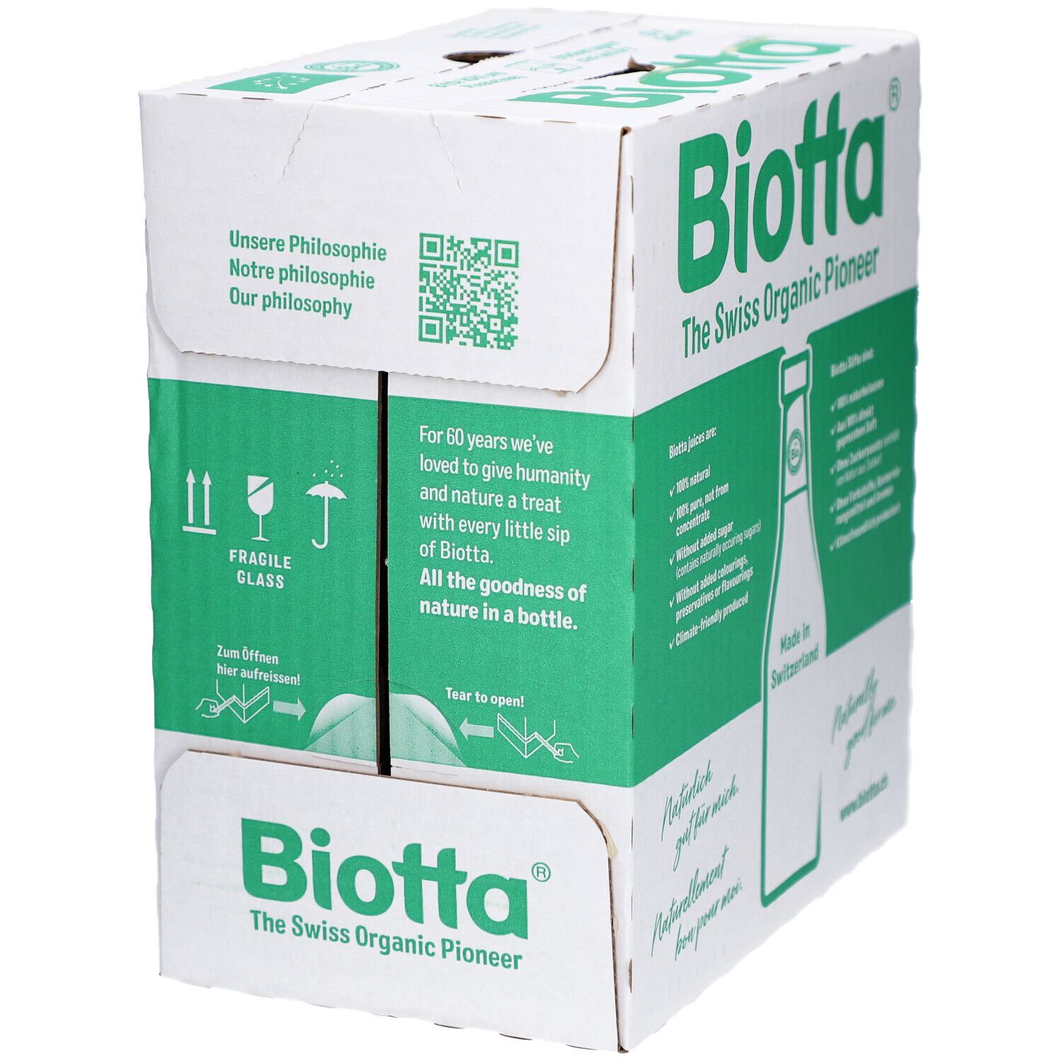 Karton mit BIOTTA-Logo und Text. Grün-weiße Verpackung mit QR-Code und Text in Deutsch und Englisch. Fragile-Symbol.