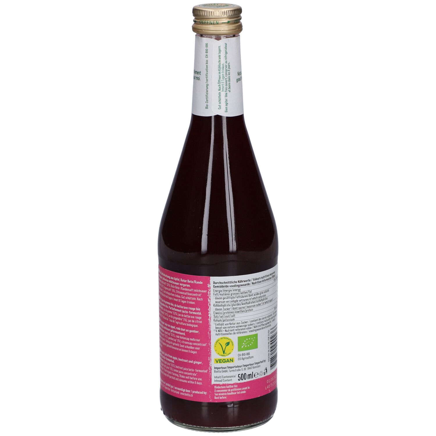 Rückansicht der Glasflasche mit rotem Saft. Etikett mit Nährwertangaben, Vegan-Siegel und Bio-Siegel. Volumen: 500 ml.