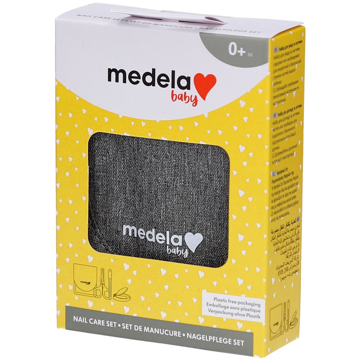 Emballage jaune avec image du produit. Inscription : Medela baby, Set de manucure. Visible : étui gris avec logo.