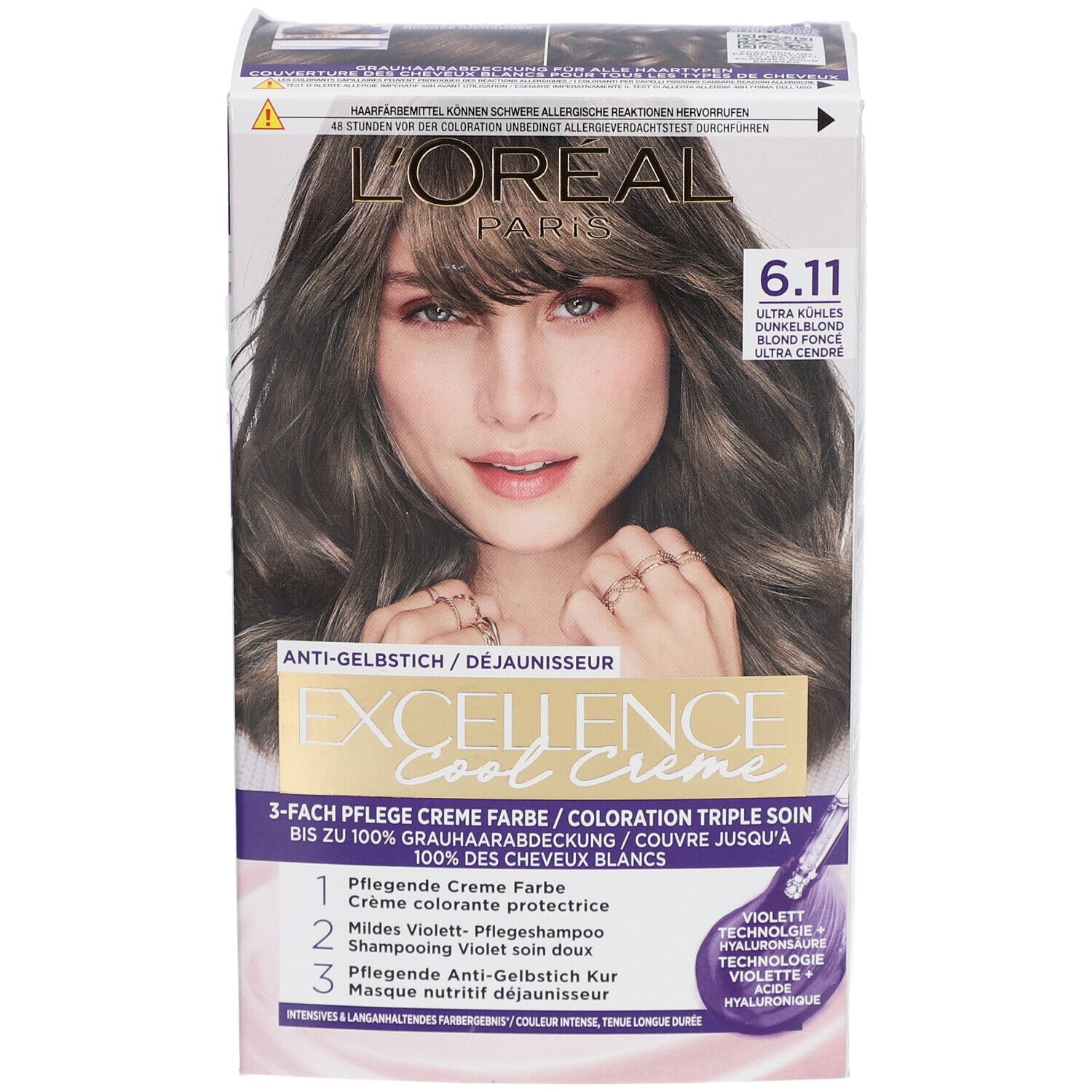 Haarfärbemittel-Verpackung. L'Oréal Paris Excellence Cool Crème, Farbton 6.11. Frau mit gefärbten Haaren abgebildet.
