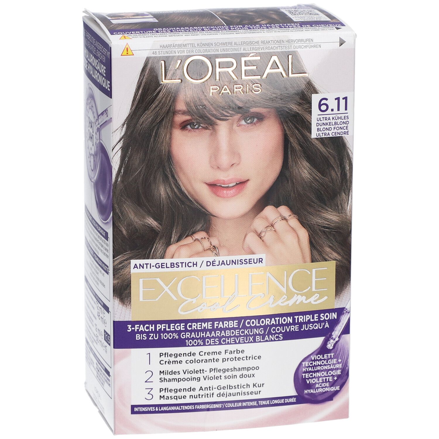 Haarfärbemittel-Verpackung. L'Oréal Paris Excellence Cool Crème, Farbton 6.11. Frau mit gefärbten Haaren abgebildet.