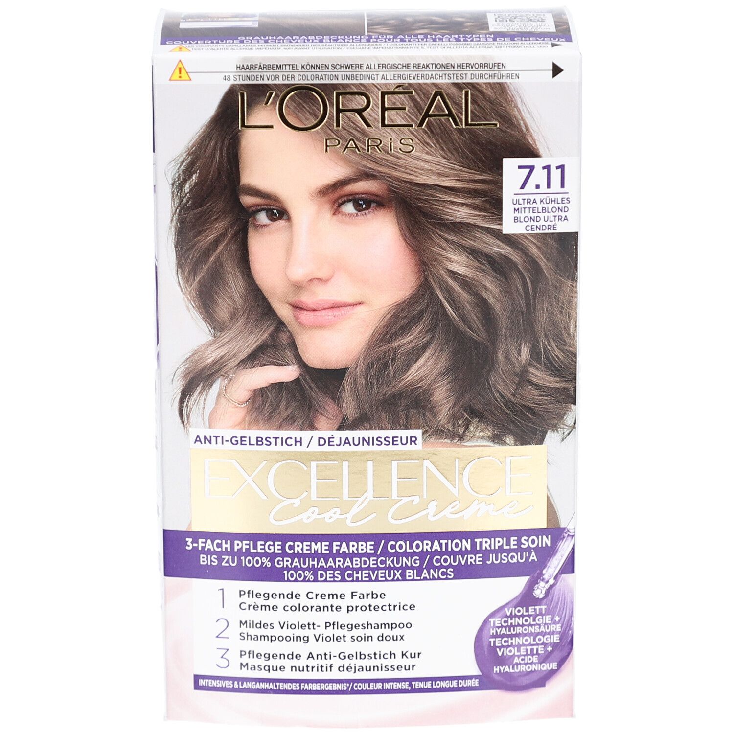 L'Oréal Paris Excellence Cool Crème 7.11. Boîte avec femme et couleur de cheveux. Texte: Anti-jaunissement, triple soin.