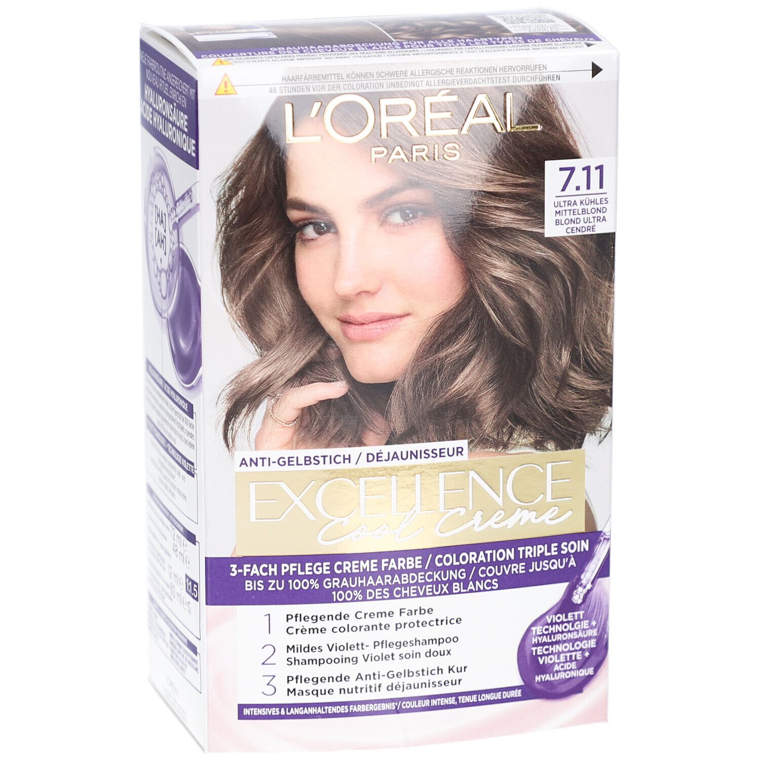 L'Oréal Paris Excellence Cool Crème 7.11. Boîte avec femme et couleur de cheveux. Texte: Anti-jaunissement, triple soin.