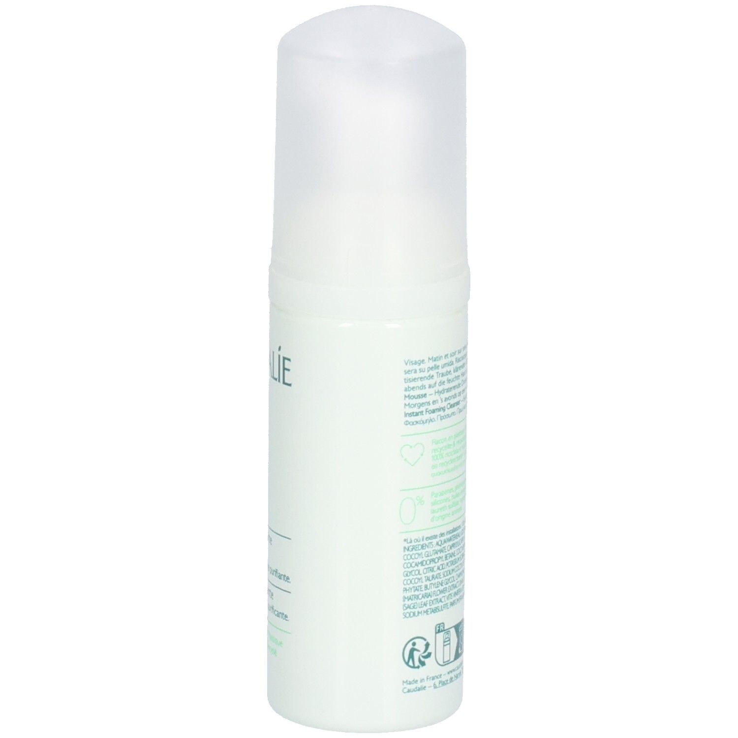 Grüne Flasche mit weißem Deckel. Aufschrift: Caudalie, Vinoclean, Mousse Nettoyante. Rückseite mit Text.
