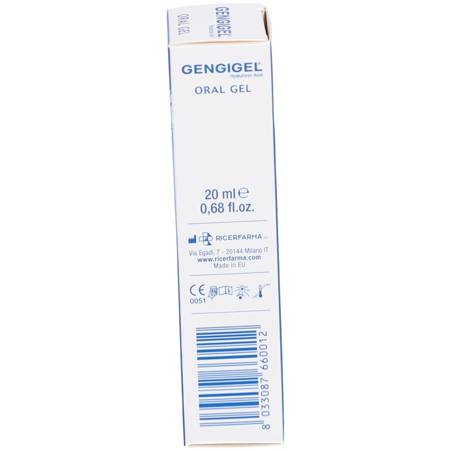 Emballage produit bleu. Inscription GENGIGEL, Oral Gel. Texte avec informations et code-barres.