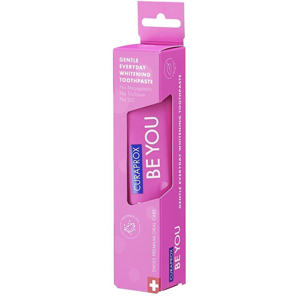Tube de dentifrice rose dans un emballage rose. Inscription : CURAPROX BE YOU. Impression : Gentle Everyday Whitening Toothpaste.