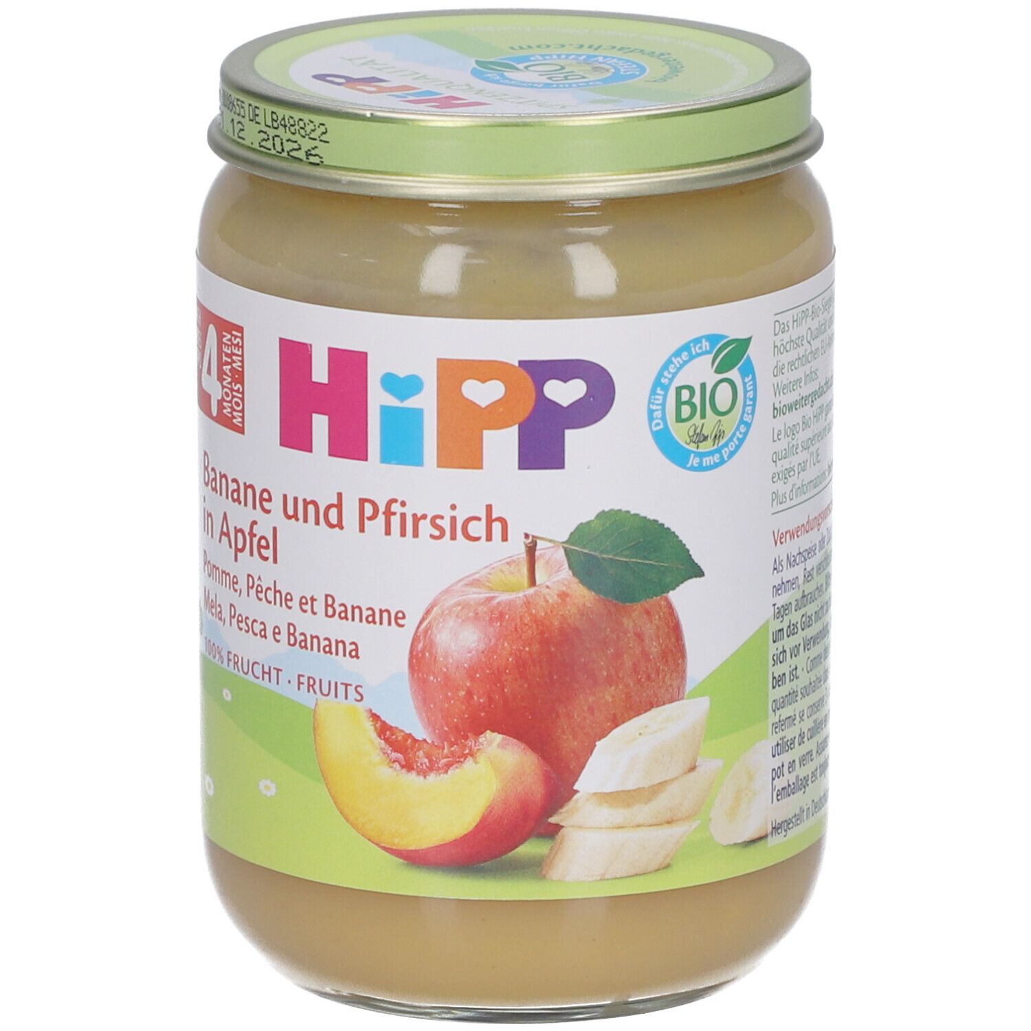 Pot de nourriture pour bébé. Inscription: HIPP, Banane et Pêche dans la pomme. Dès 4 mois. Label bio. Illustration de pomme, pêche et banane.