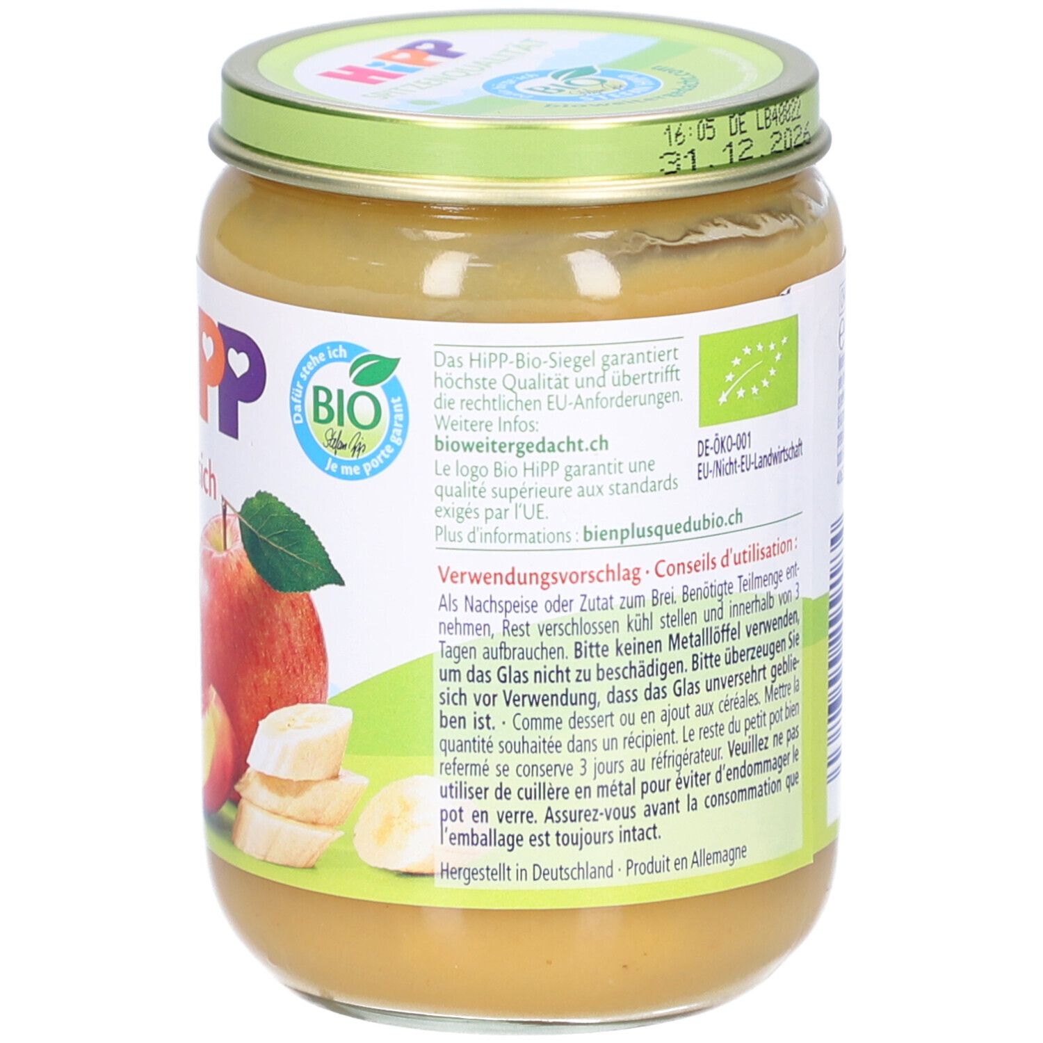 Pot de nourriture pour bébé. Dos avec informations. Inscription: HIPP, Banane et Pêche dans la pomme. Label bio. Fabriqué en Allemagne.