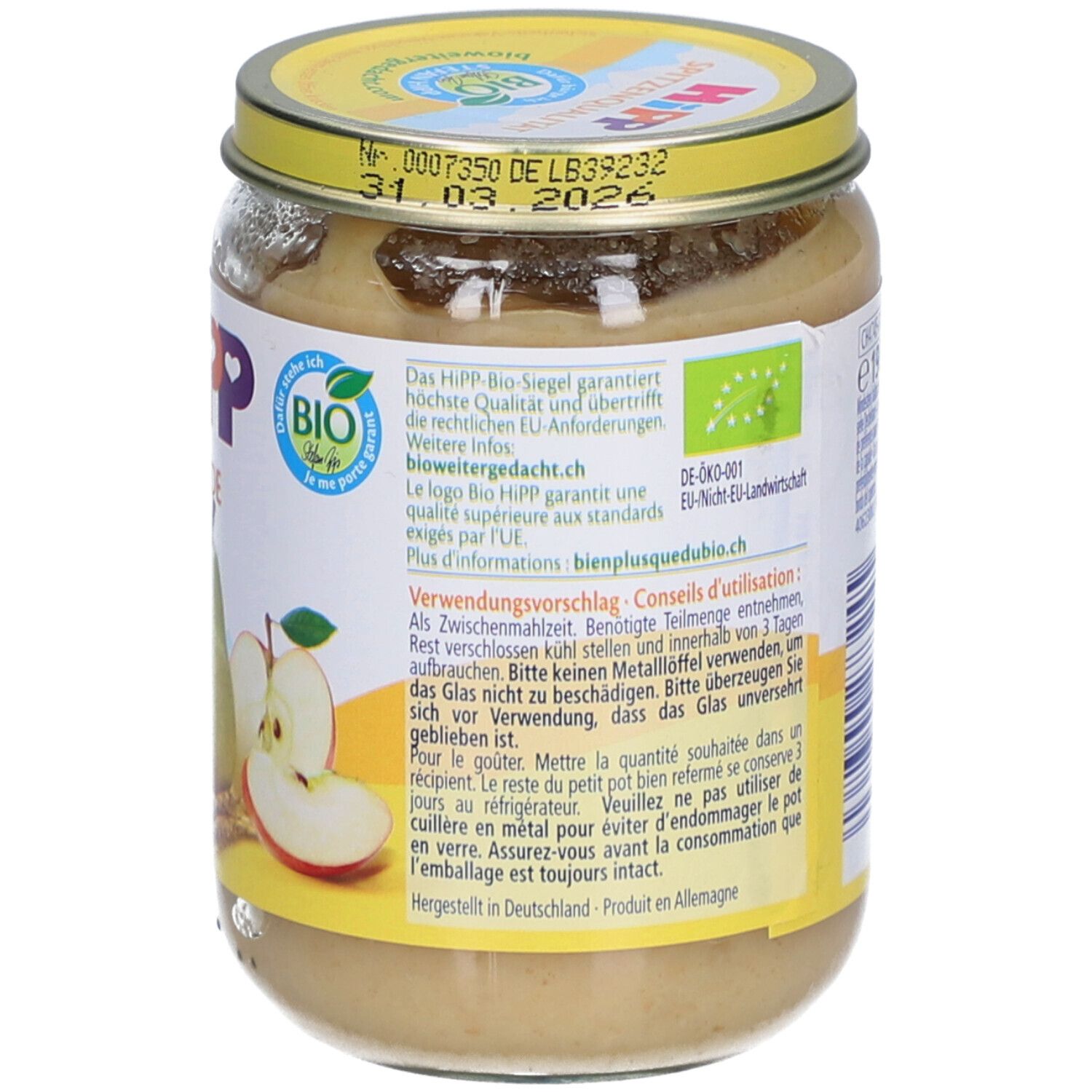 Rückseite des Glases HiPP Bio-Püree Birne Apfel mit Dinkel. Informationen, Bio-Siegel und Verwendungs-Hinweise.