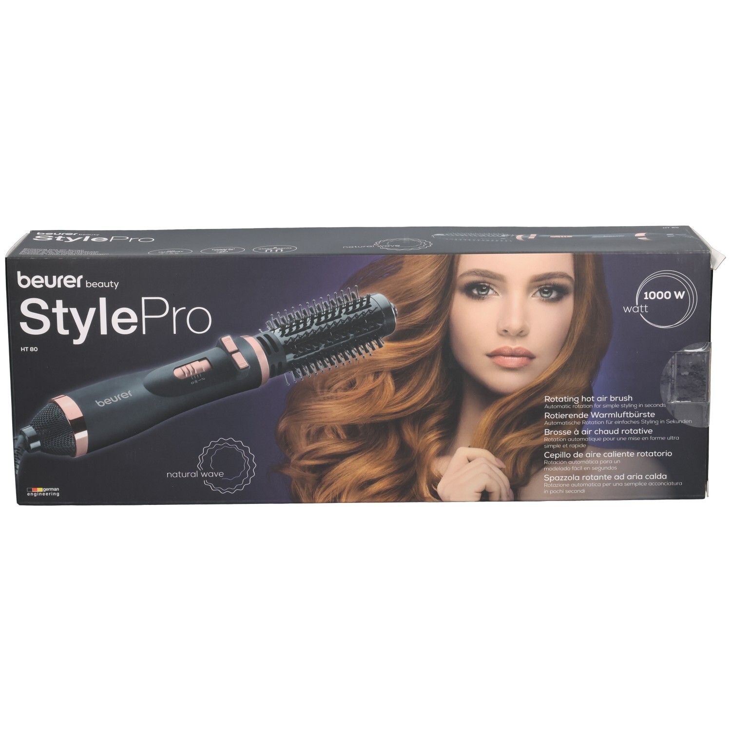 Brosse à air chaud Beurer StylePro dans son emballage. Brosse noire avec accents or rose. Nom du produit et numéro de modèle.