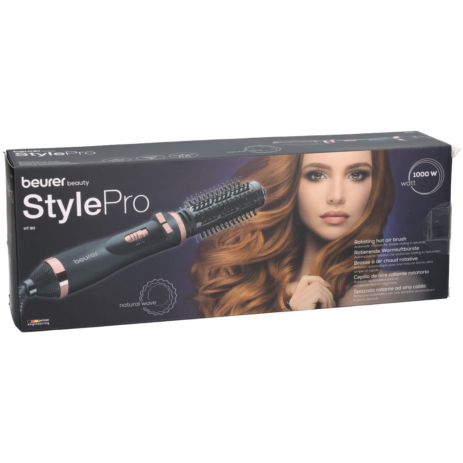 Brosse à air chaud Beurer StylePro dans son emballage. Brosse noire avec accents or rose. Nom du produit et numéro de modèle.