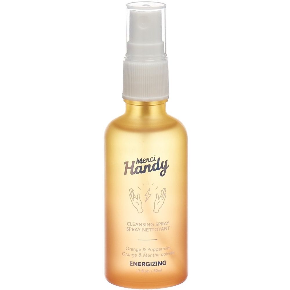 Spray nettoyant jaune-orangé avec vaporisateur blanc. Inscription : Merci Handy, Cleansing Spray, Energizing. Symbole mains.