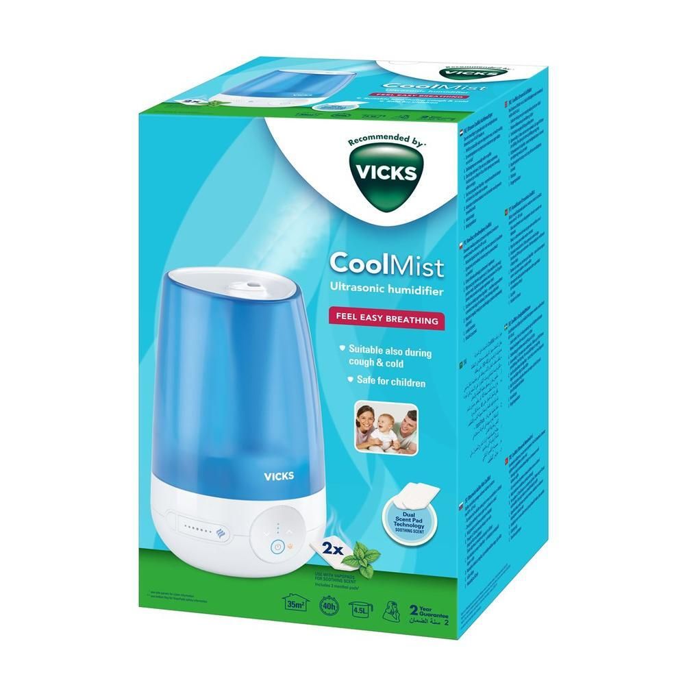 Blauer und weißer Luftbefeuchter in Verpackung. Vicks CoolMist. Geeignet bei Husten und Erkältung. Sicher für Kinder.