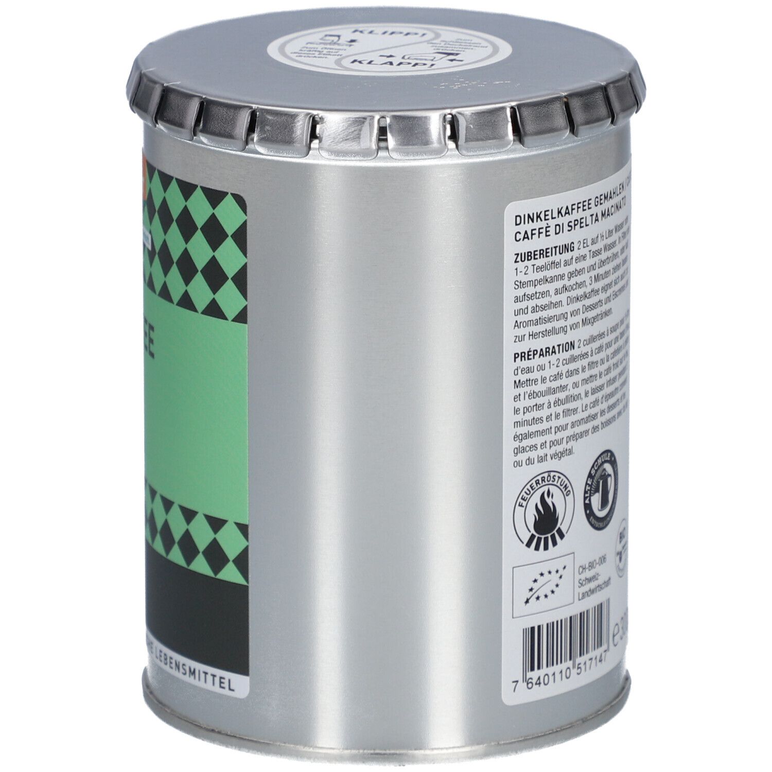 Zylindrischer Metallbehälter mit Deckel. Aufschrift: Dinkelkaffee, Café d'épeautre, Caffè di Spelta. Rückseite mit Text.