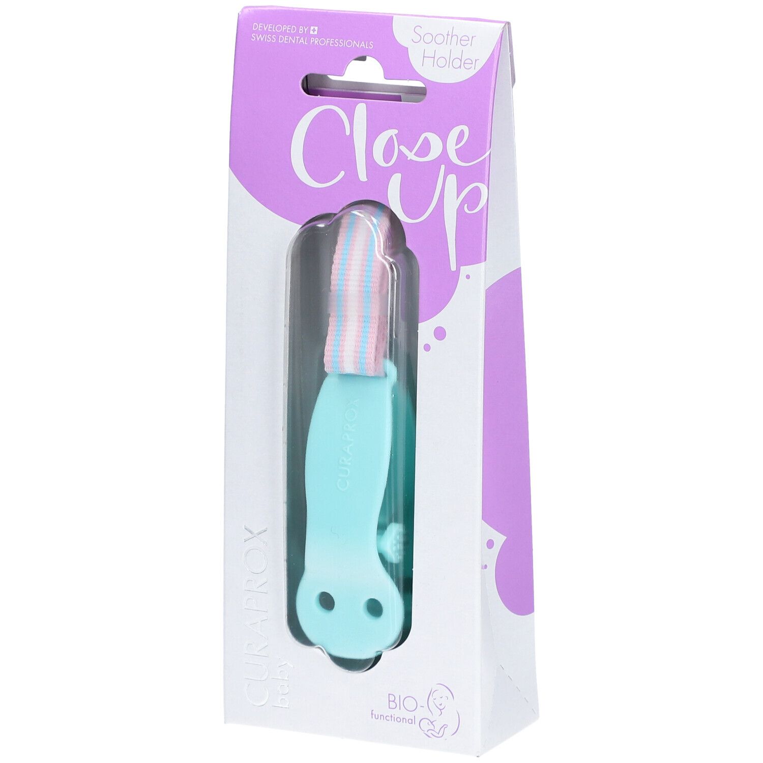 Türkisfarbener Schnullerhalter in Verpackung. Sichtbar: CURAPROX, Close Up, BIO-Funktional. Halter mit Band in Rosa und Blau.