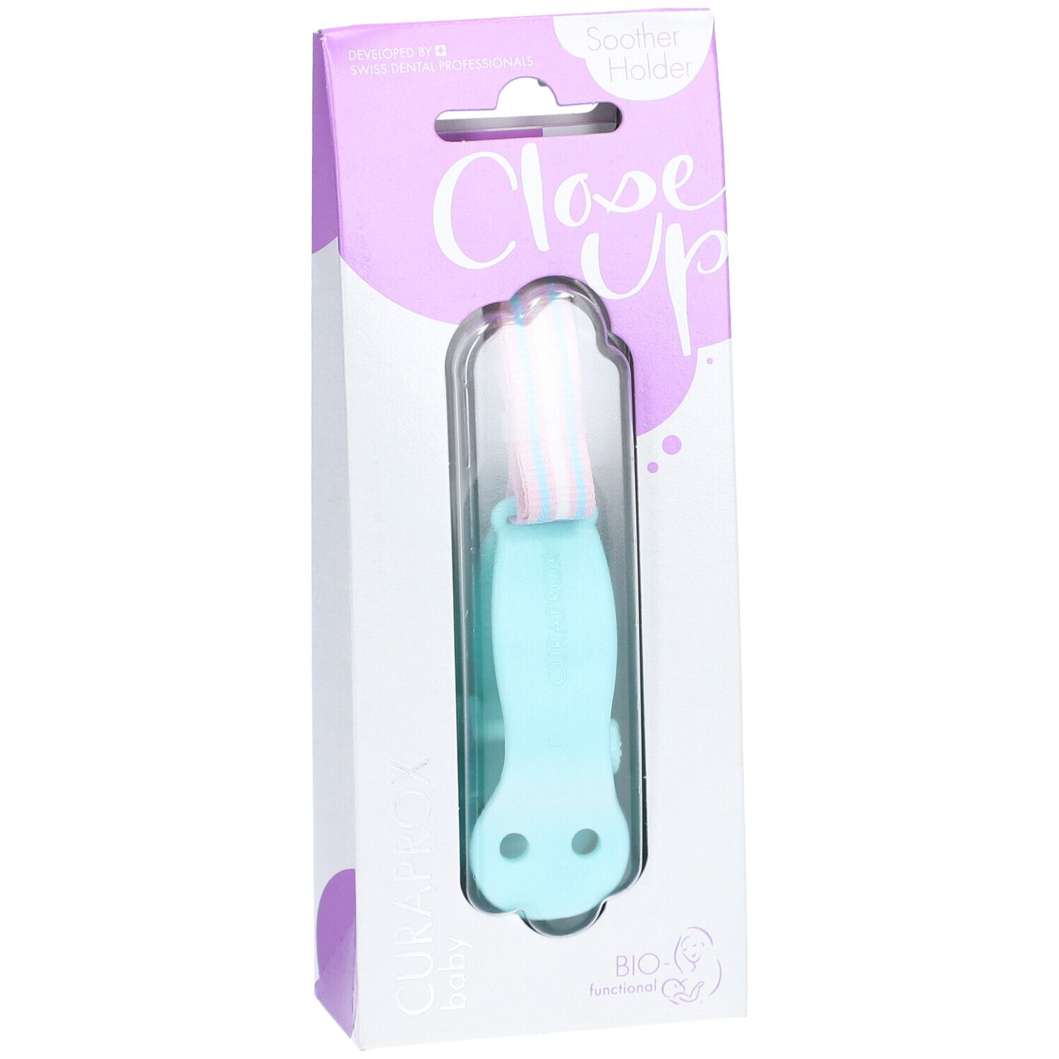 Türkisfarbener Schnullerhalter in Verpackung. Sichtbar: CURAPROX, Close Up, BIO-Funktional. Halter mit Band in Rosa und Blau.