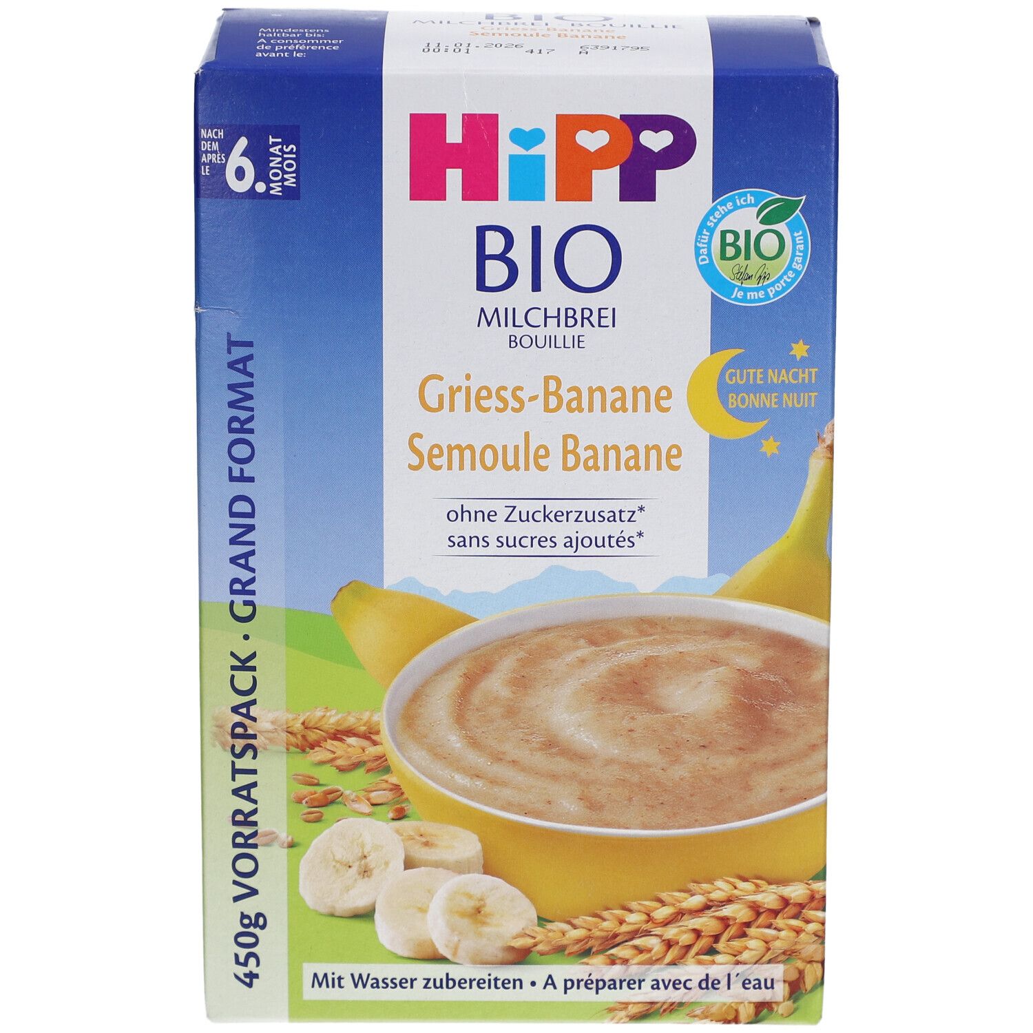 Boîte HIPP Bio Milchbrei Grieß Banane. Image du produit, logo et texte. Label bio et texte "Ab 6 Monaten".
