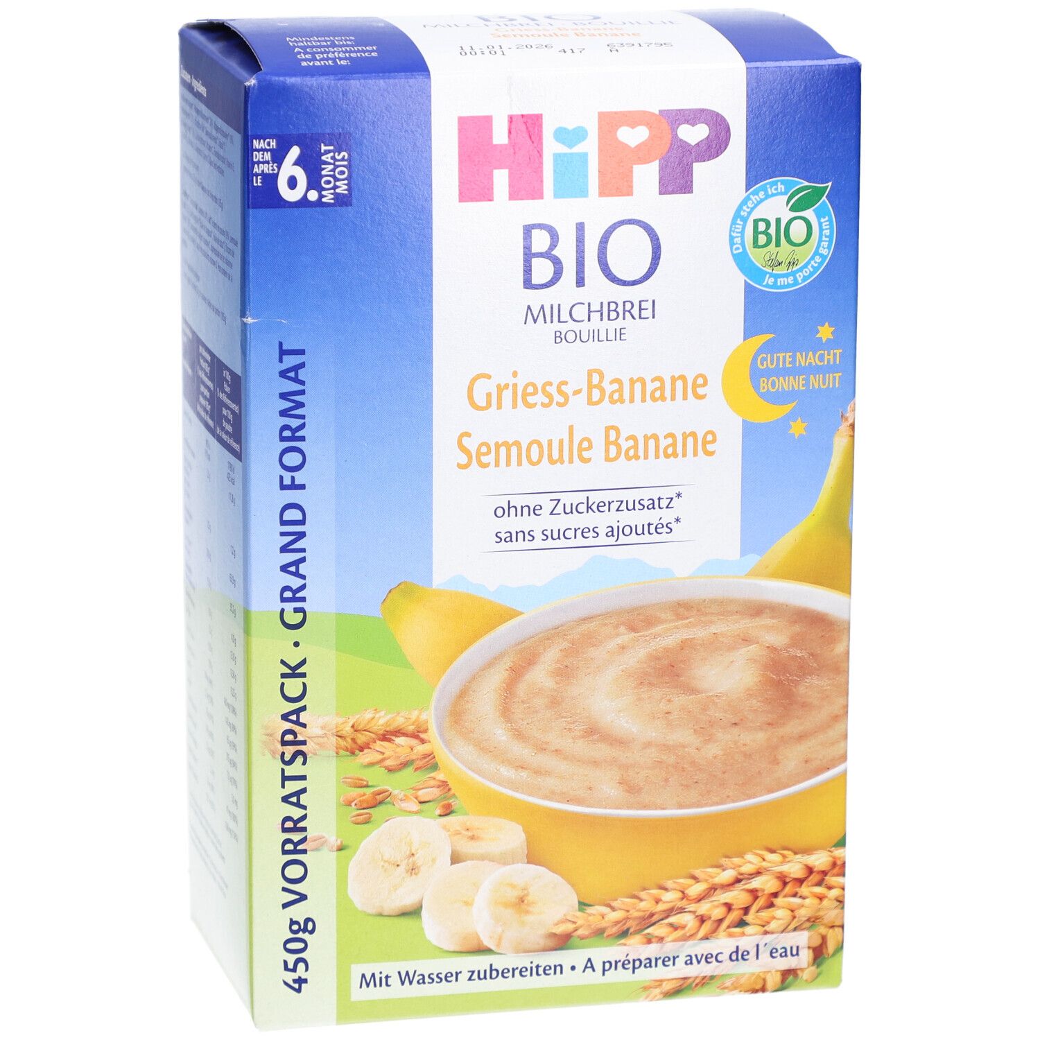 Boîte HIPP Bio Milchbrei Grieß Banane. Image du produit, logo et texte. Label bio et texte "Ab 6 Monaten".