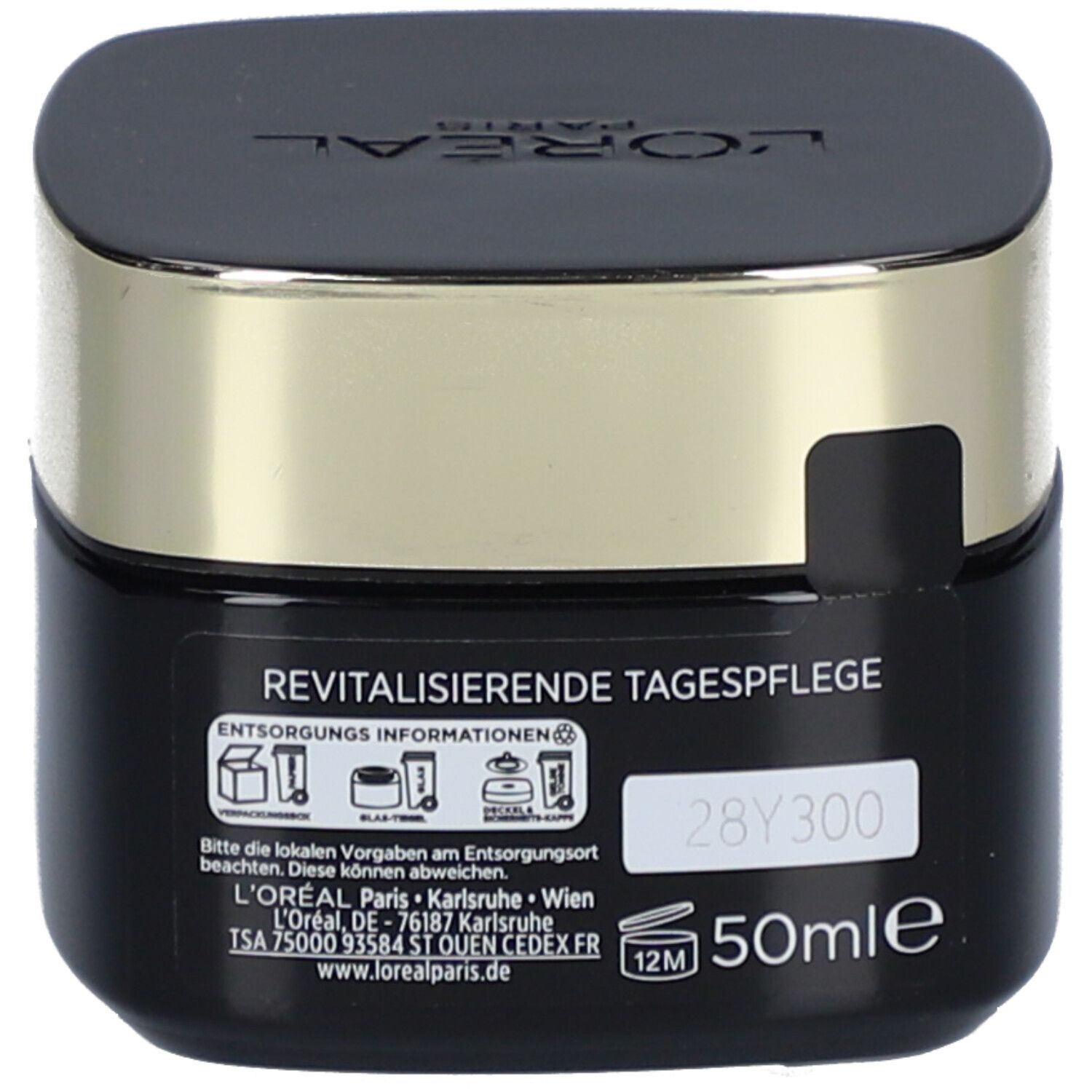 Schwarzer Tiegel mit goldfarbenem Deckel. Aufschrift REVITALISIERENDE TAGESPFLEGE. 50ml. Marke L'Oréal.