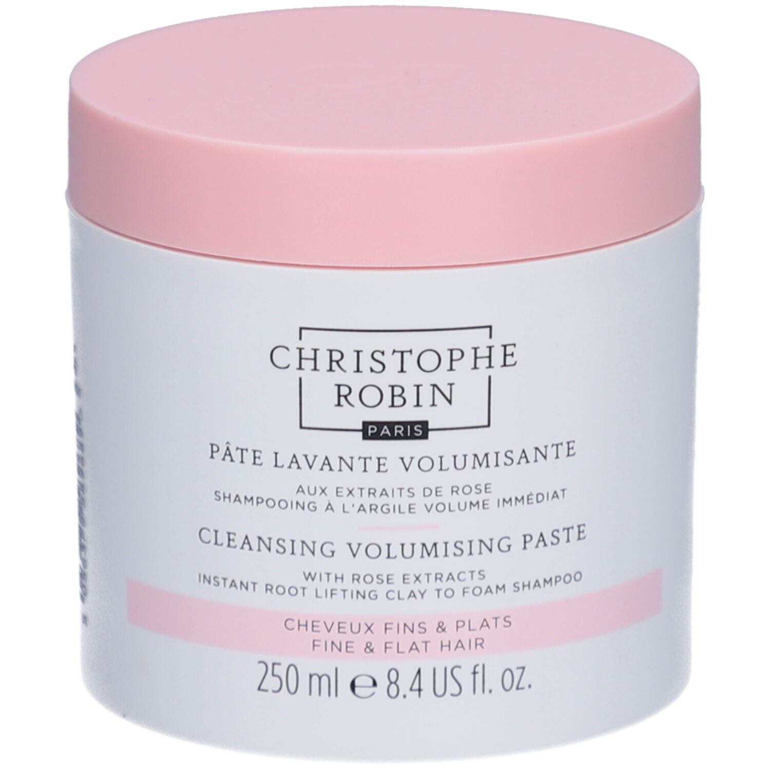 Pot rond, couvercle rose. Inscription: Christophe Robin Paris. Pâte Lavante Volumissante. 250 ml.