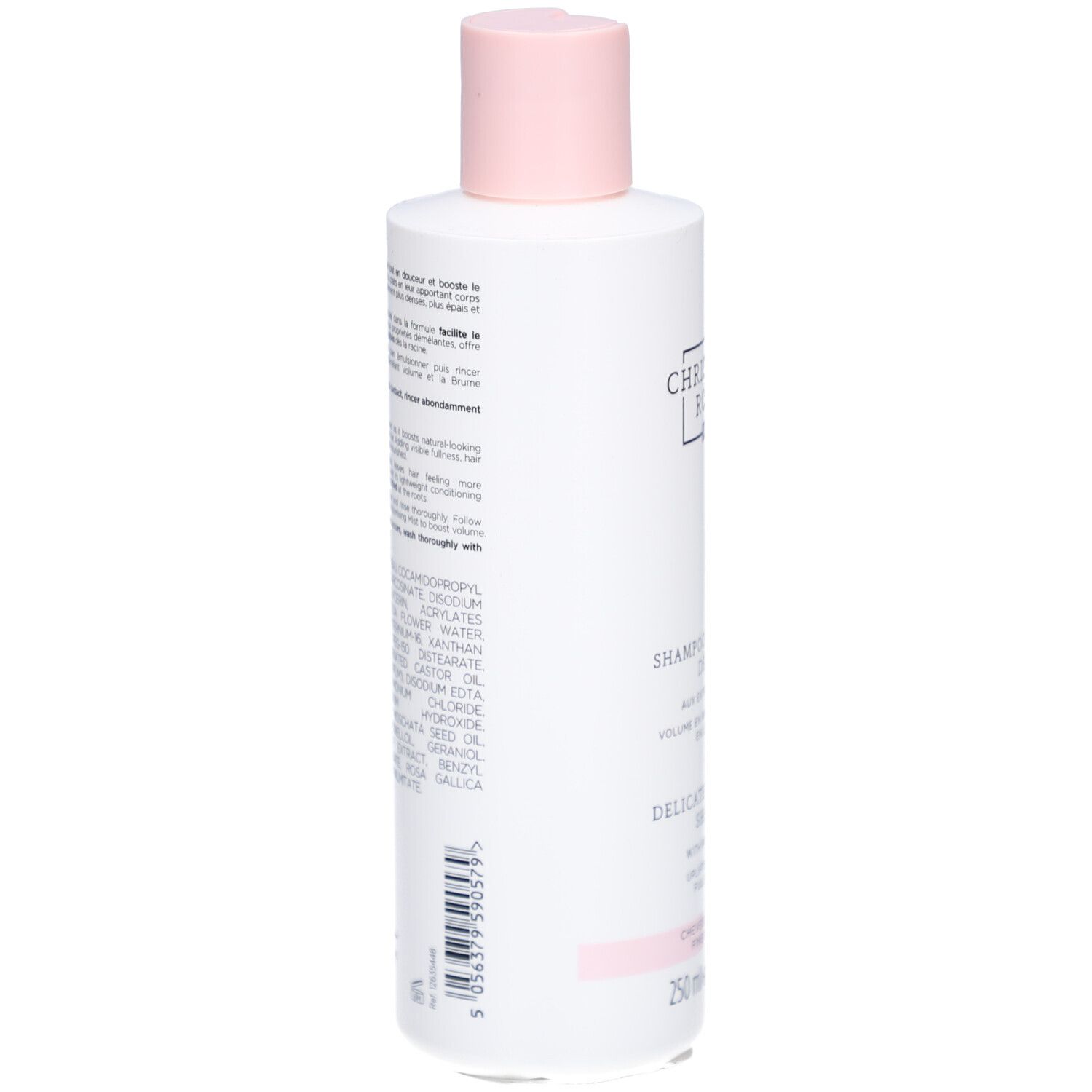 Dos du flacon de shampooing. Texte et ingrédients visibles. Flacon blanc avec accents roses.