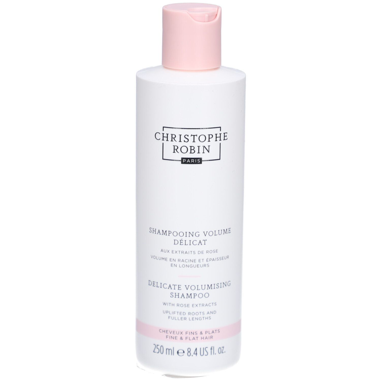 Flacon de shampooing blanc avec bouchon rose. Texte: Christophe Robin, Shampooing Délicat Volume, 250 ml.
