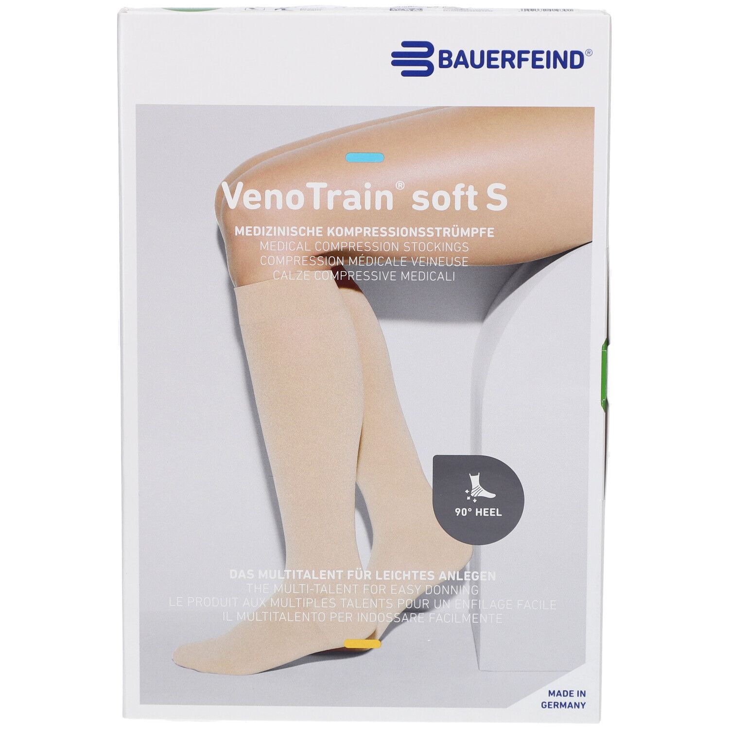 Verpackung mit Kompressionsstrümpfen. Marke: Bauerfeind VenoTrain soft S. Farbe: Creme. Mit Mikropunkten und spezieller Ferse.