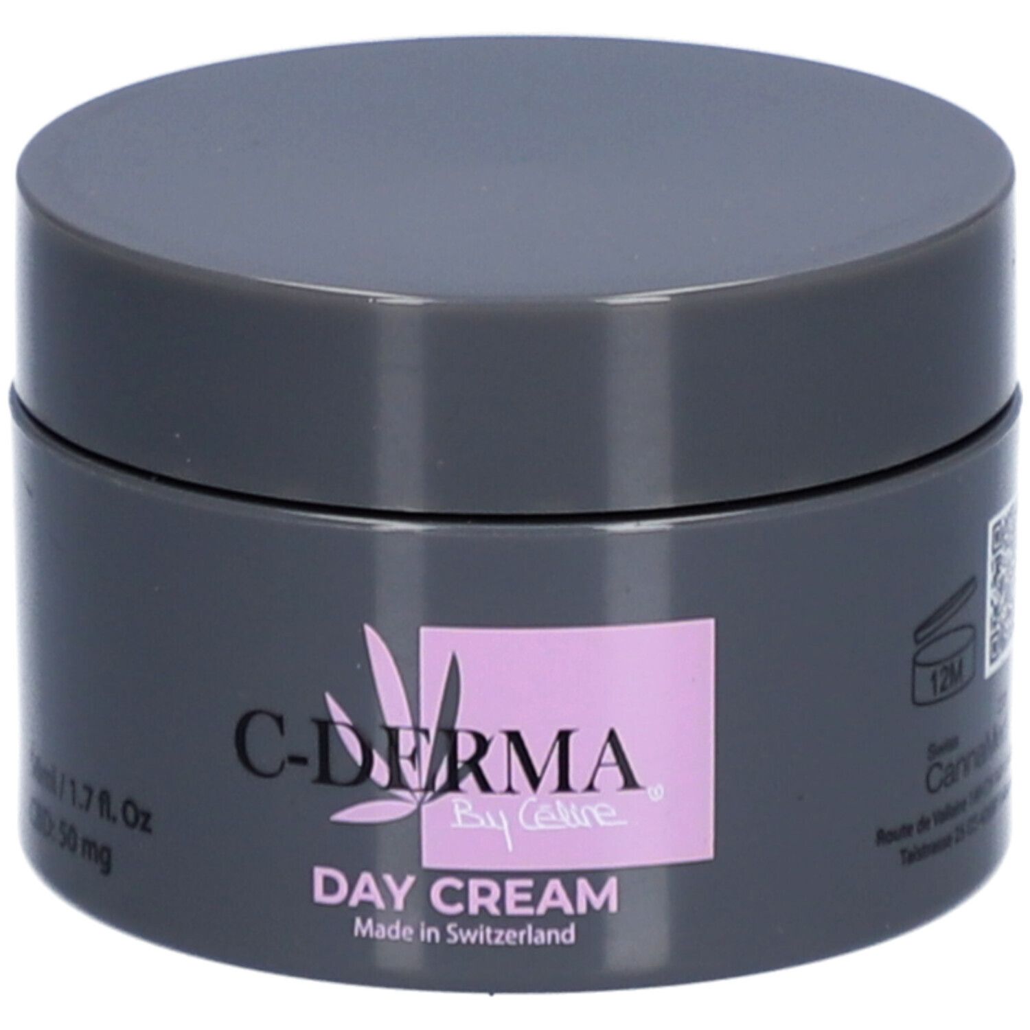 Dunkelgrauer Tiegel mit Deckel. Aufdruck: C-DERMA By Celine, Day Cream, Made in Switzerland. Rosa Feld mit Logo.
