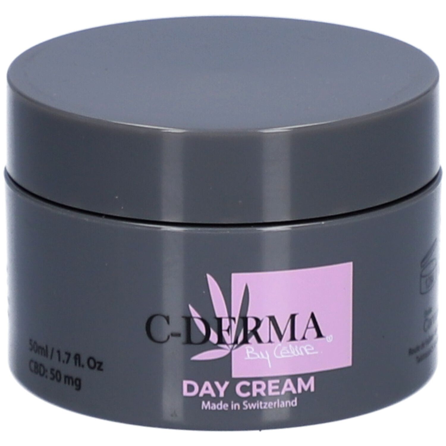 Dunkelgrauer Tiegel mit Deckel. Aufdruck: C-DERMA By Celine, Day Cream, Made in Switzerland. Rosa Feld mit Logo.