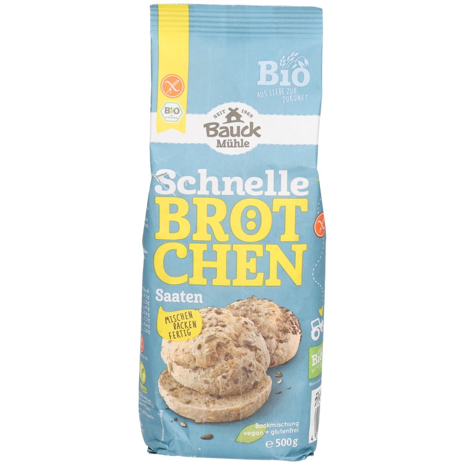 Emballage bleu clair avec l'inscription "Schnelle Brötchen Saaten". Label bio et symbole sans gluten. Illustration de petits pains aux graines.