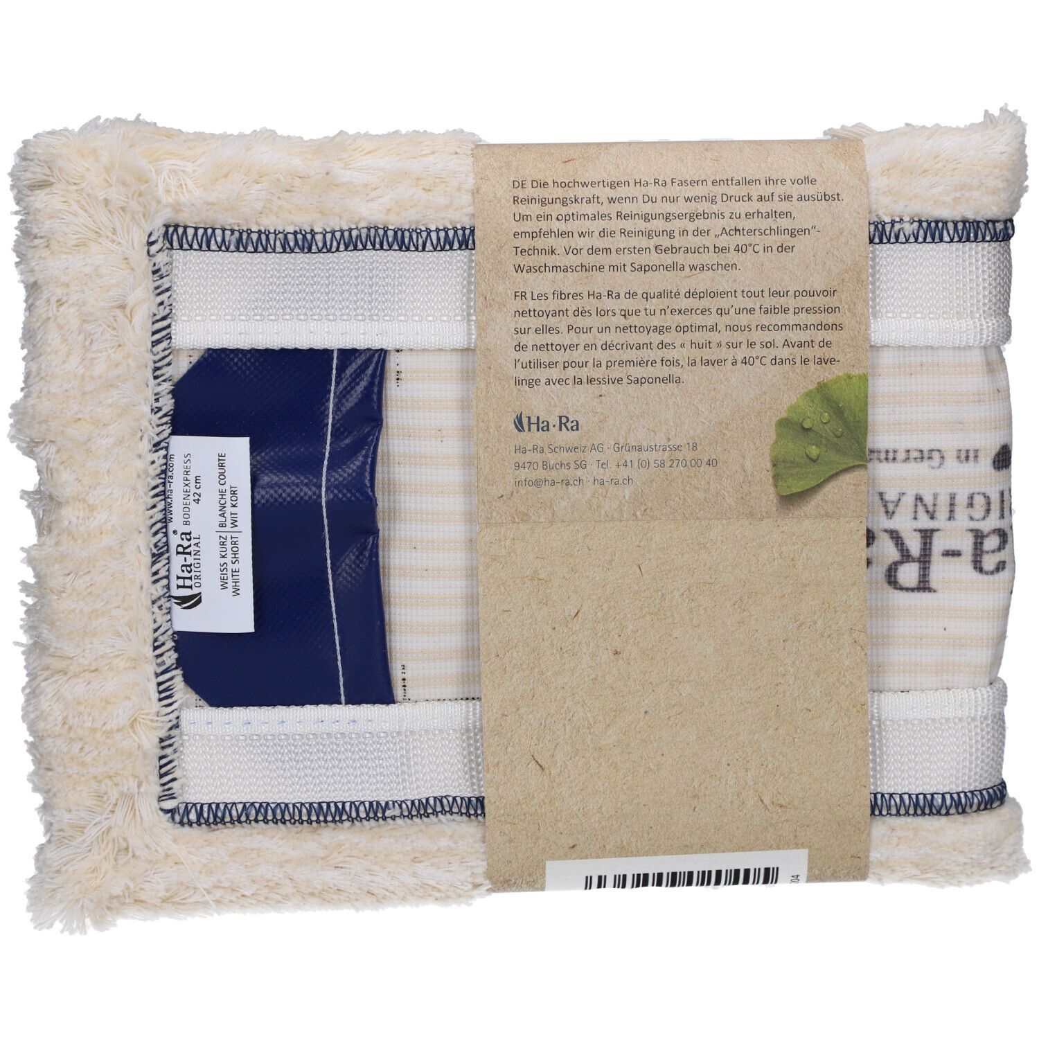 Boden-Faser, weiß, kurz. Rechteckige Faser mit blauem Verschluss. Papierbanderole mit Text und Logo. "Ha-Ra"-Logo sichtbar.