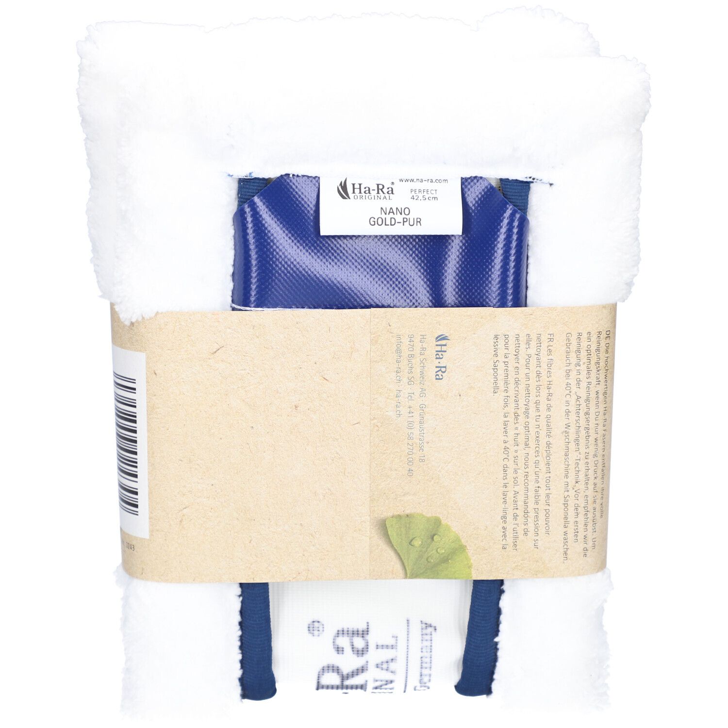 Chiffon de sol blanc, partiellement emballé. Inscription: Ha-Ra Original, Nano Gold-PUR. Emballage avec informations produit.