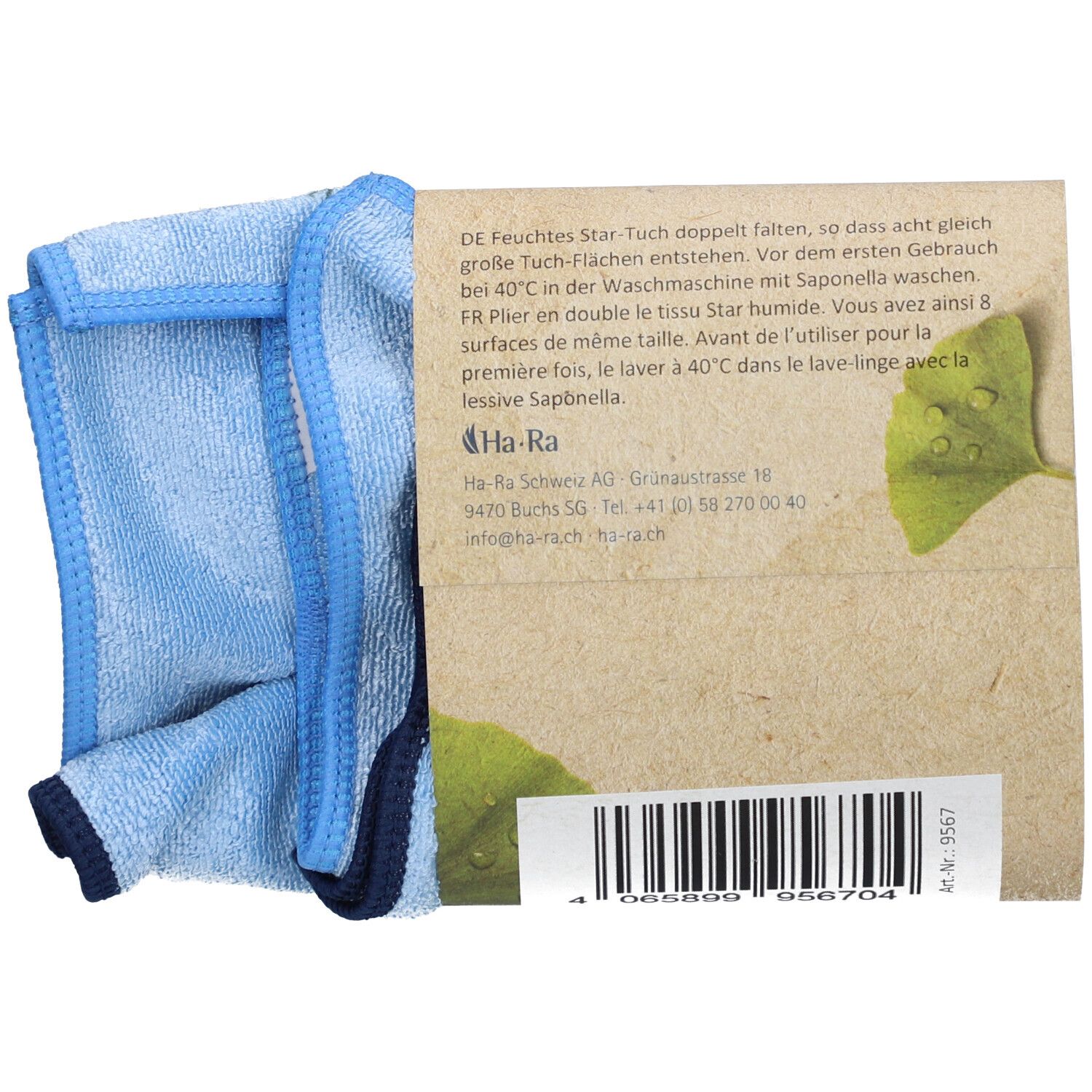 Blaues Mikrofasertuch, gefaltet. Aufdruck: Ha-Ra. Text auf der Verpackung.
