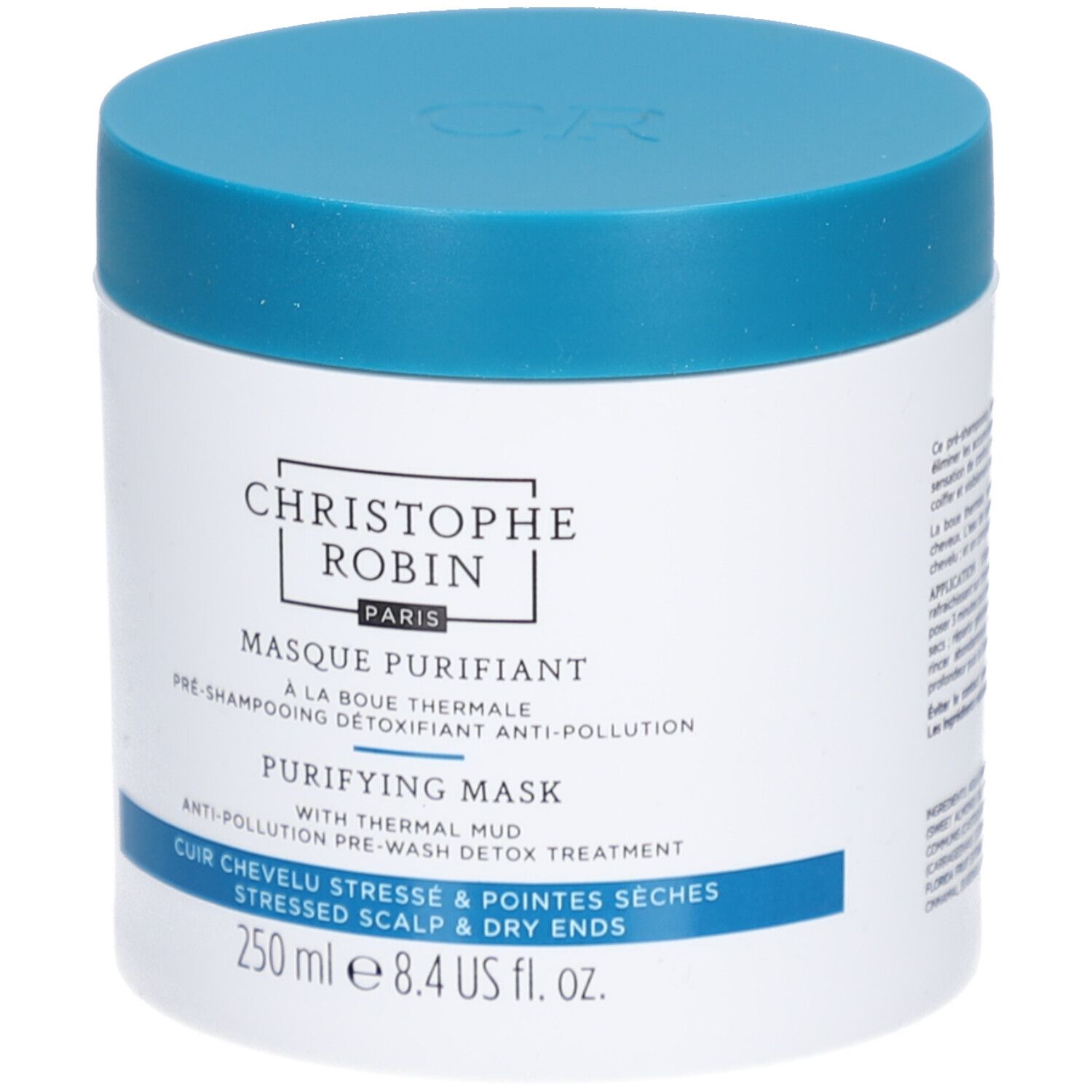 Weißer Tiegel mit blauem Deckel. Aufschrift: Christophe Robin, Masque Purifiant, 250 ml.
