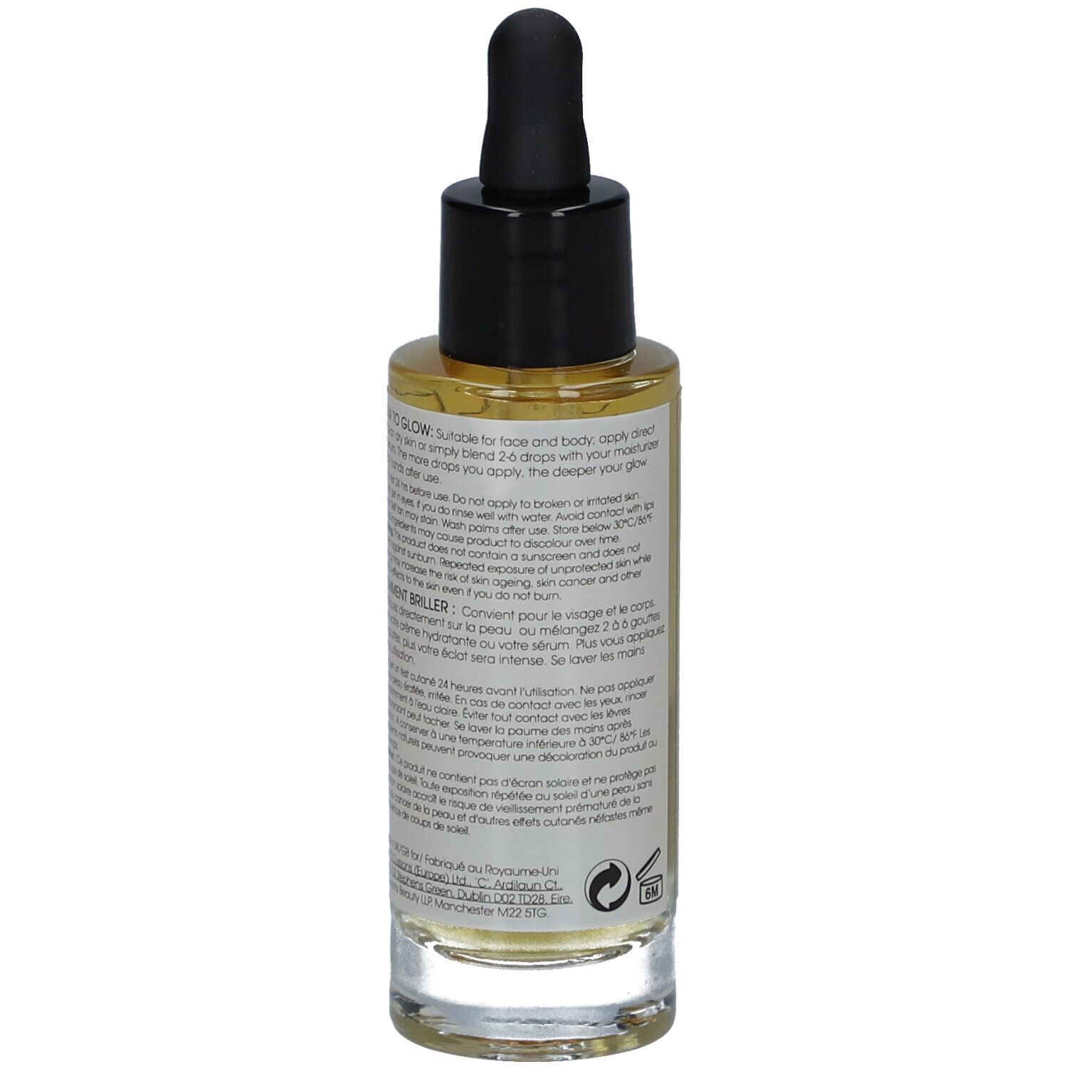 Rückseite der Glasflasche mit brauner Flüssigkeit. Schwarzer Deckel und Pipette. Text in mehreren Sprachen.