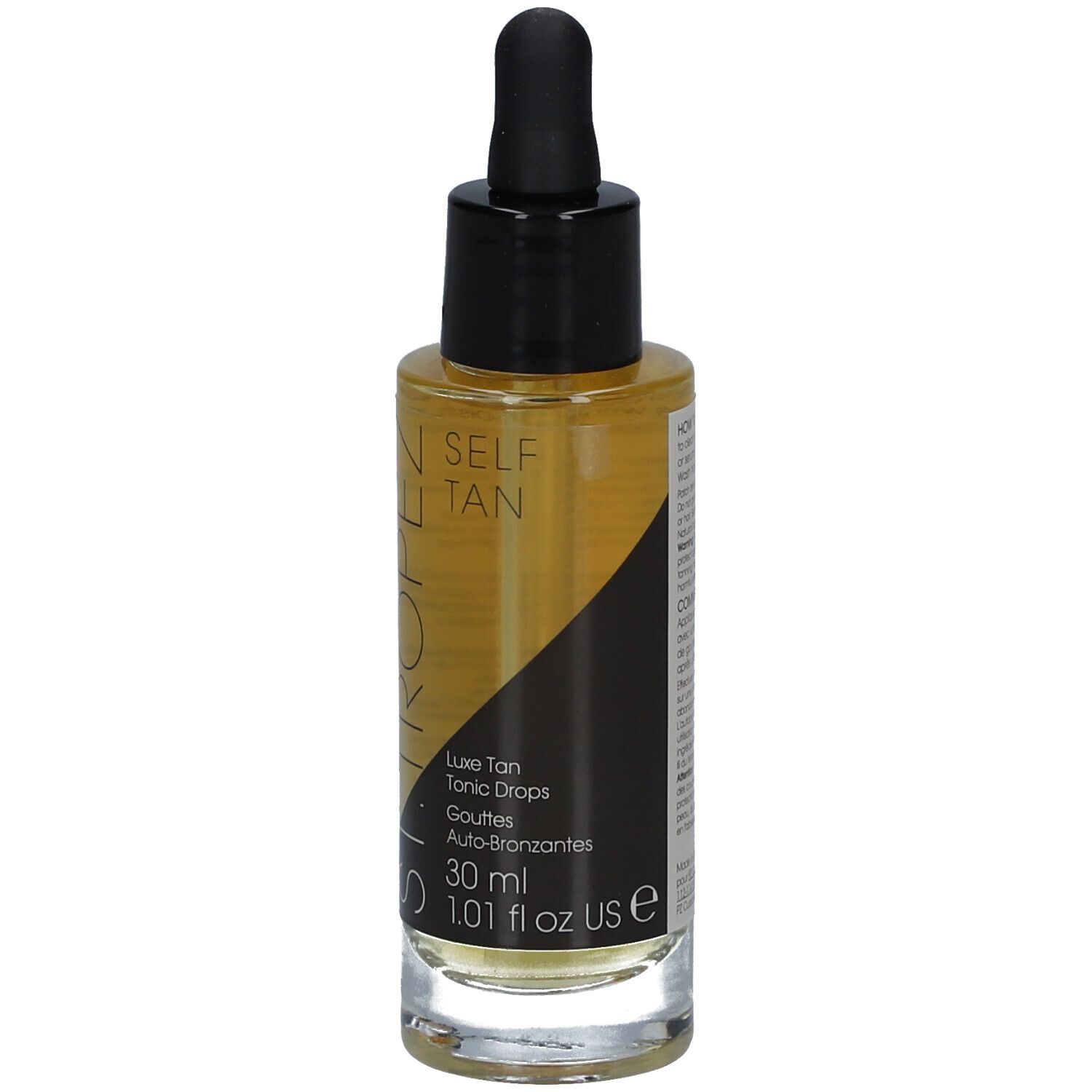 Braune Flüssigkeit in einer Glasflasche mit schwarzem Deckel und Pipette. Aufschrift: SELF TAN, Luxe Tan Tonic Drops.