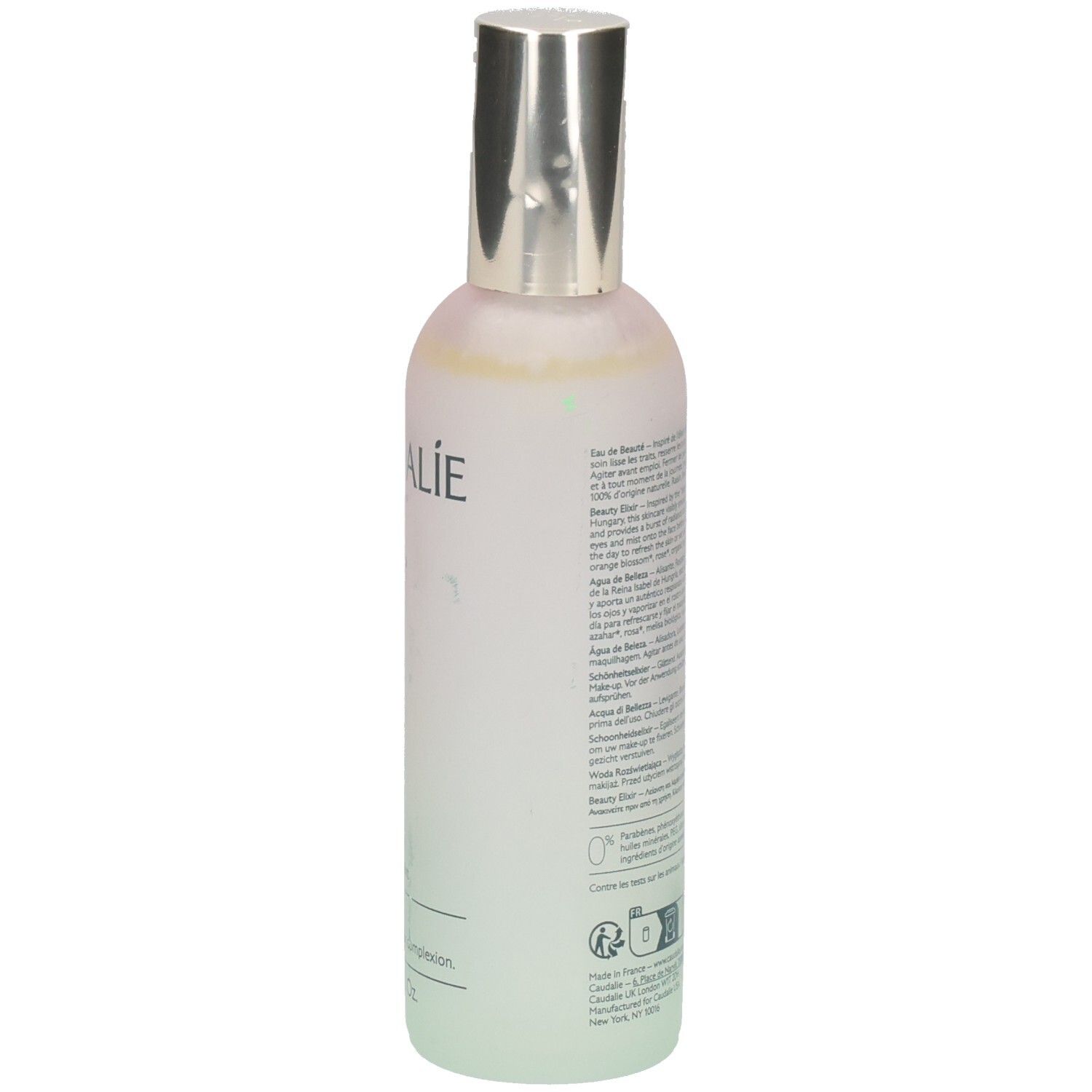 Dos du flacon. Texte en plusieurs langues. Inscription CAUDALIE. Étiquette avec informations et logos.