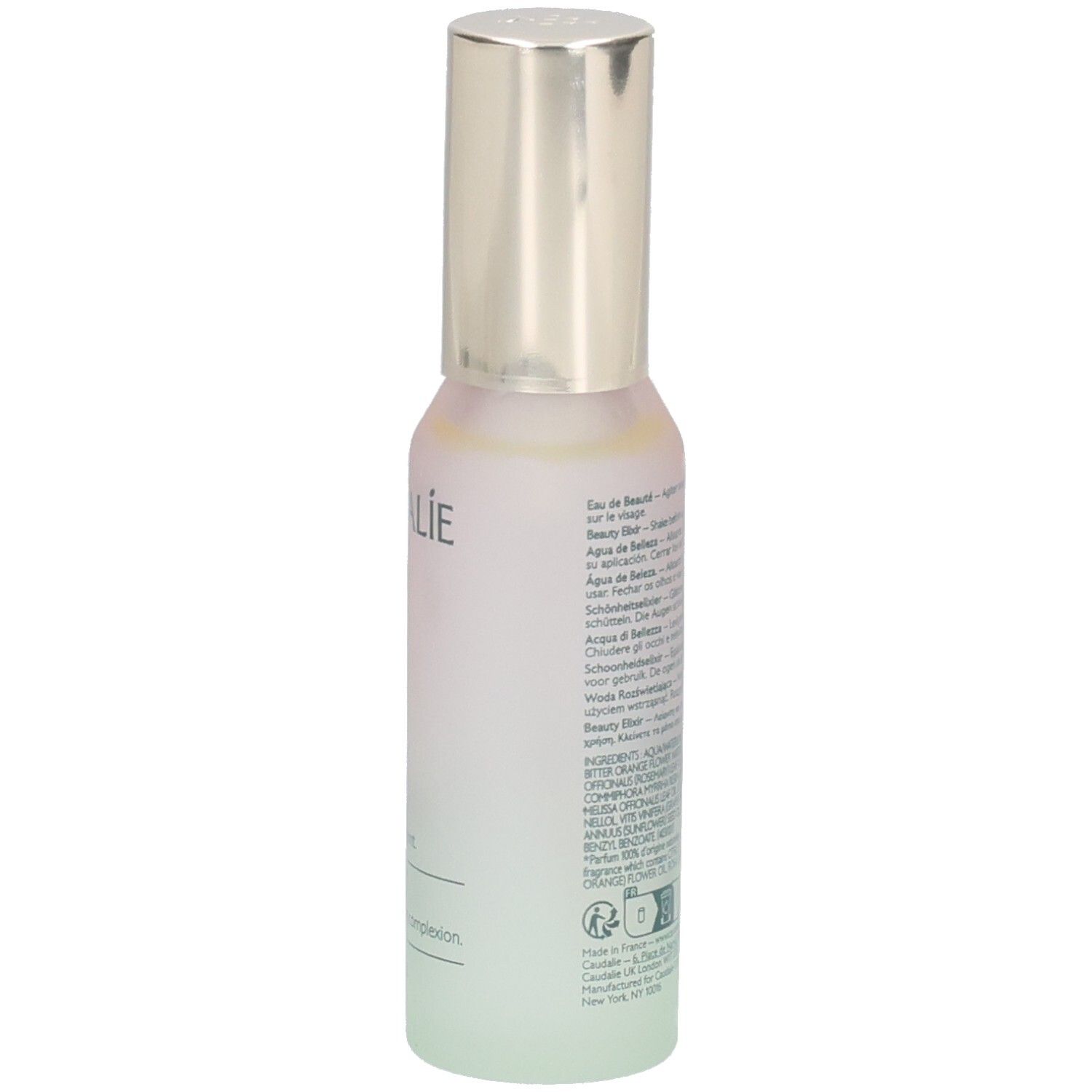Rückseite des Flakons. Text: Eau de Beauté, Beauty Elixir, Inhaltsstoffe, Chargennummer, Logos.
