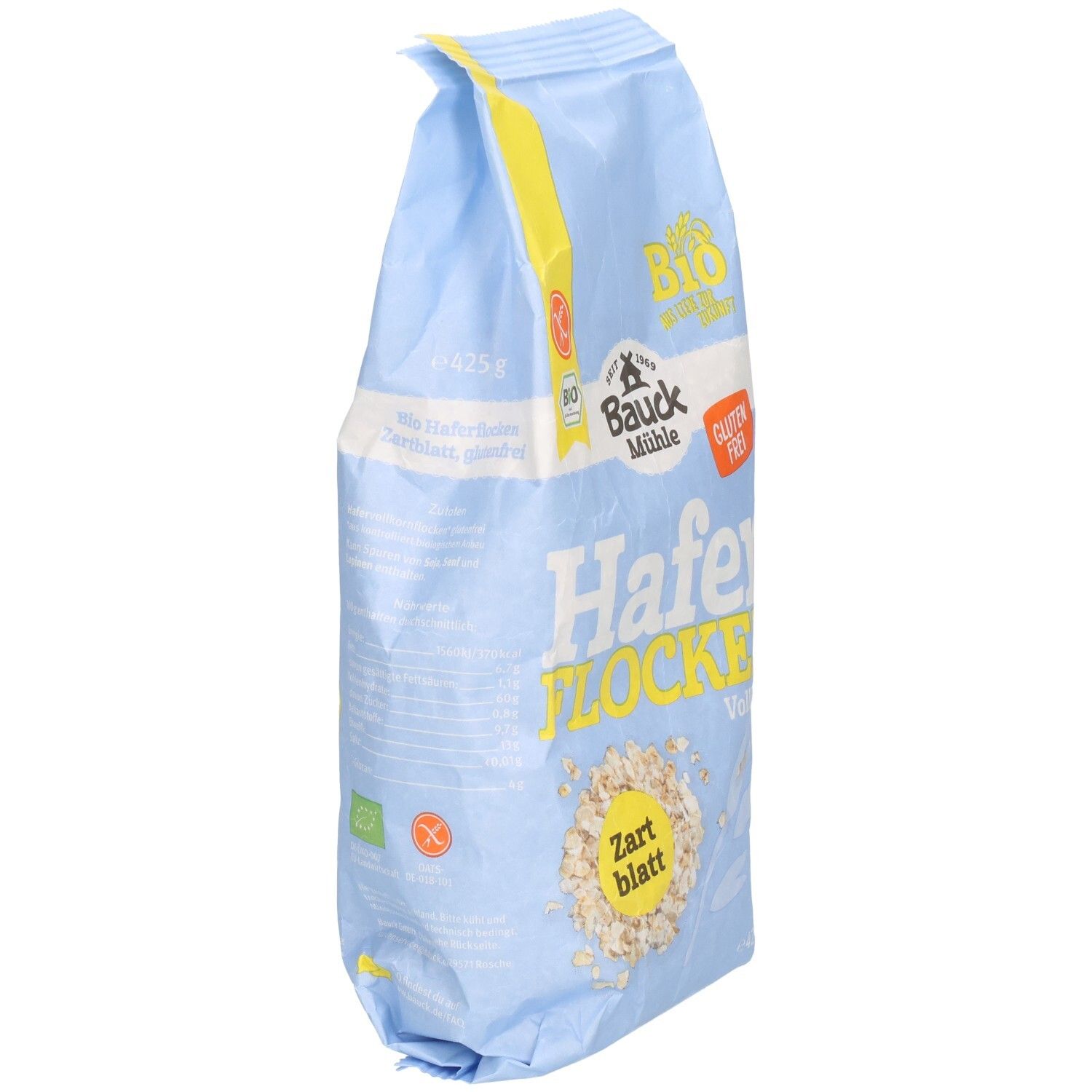 Sachet bleu clair de flocons d'avoine. Inscription : Bauck Mühle, flocons d'avoine tendres sans gluten. Label bio et logo sans gluten.