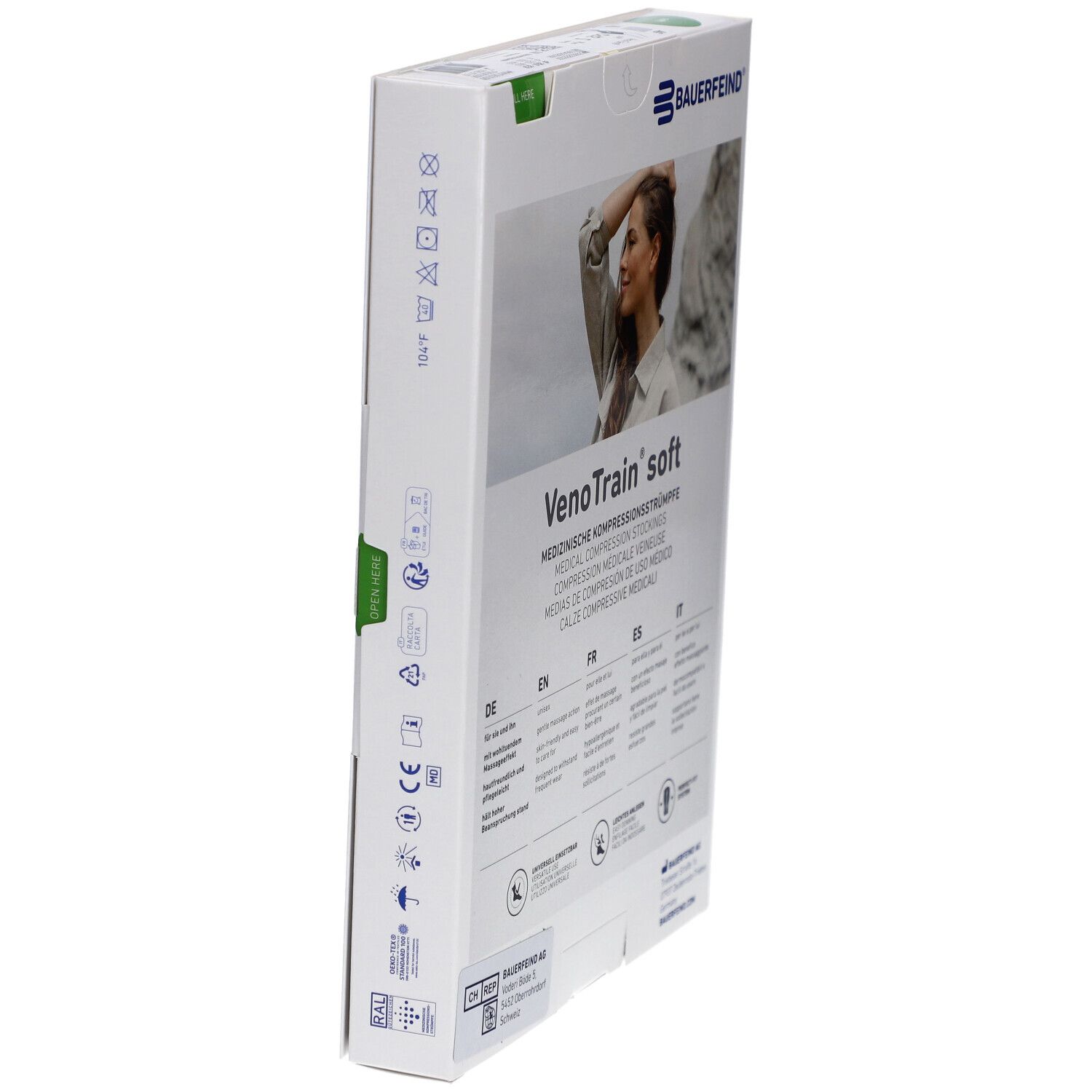 Vue latérale de la boîte de bas de compression. Marque : BAUERFEIND. Inscription : VenoTrain soft. Symboles et texte.