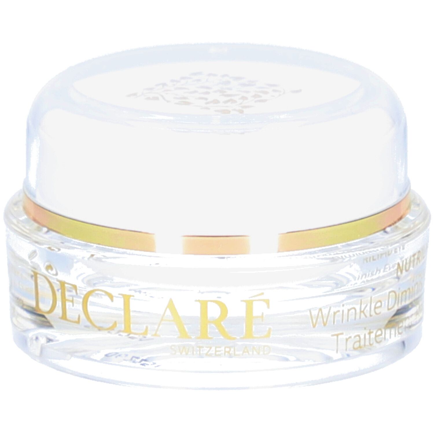 Pot transparent avec couvercle blanc et anneau doré. Inscription DECLARE SWITZERLAND. Produit pour les yeux.