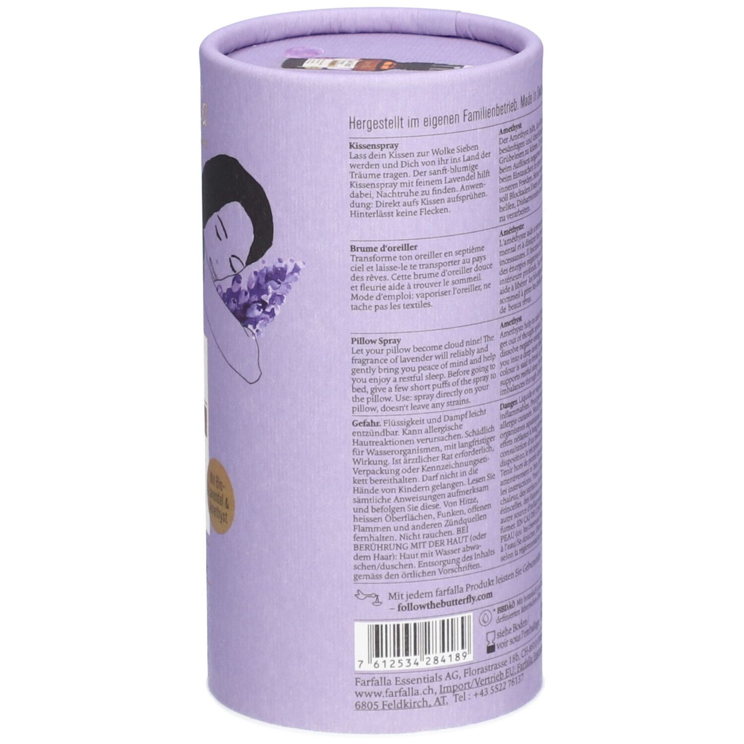 Emballage cylindrique, lilas clair. Texte sur le côté, y compris l'adresse et les coordonnées. Fabriqué en Suisse.