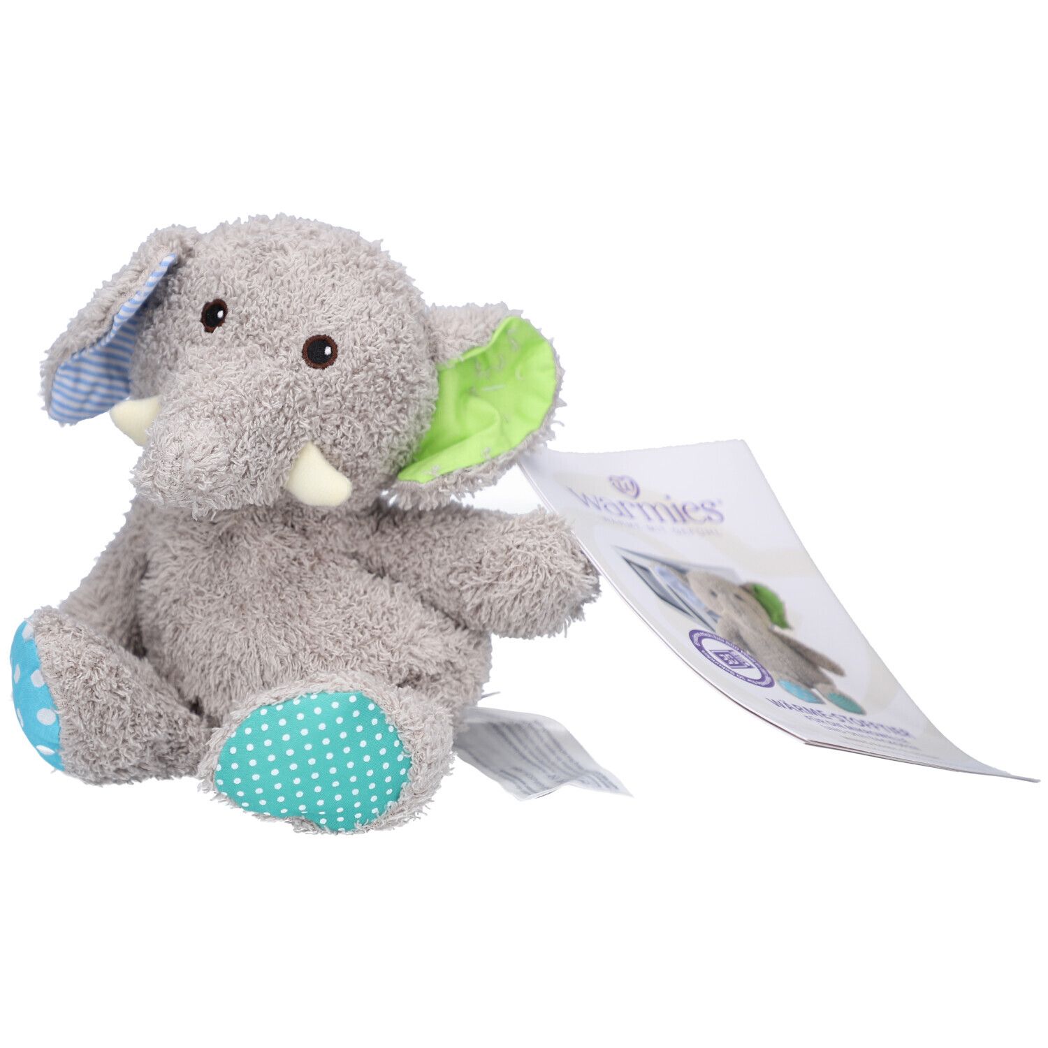 Éléphant en peluche gris avec accents bleus et verts. Oreilles à motifs. Étiquette avec logo.